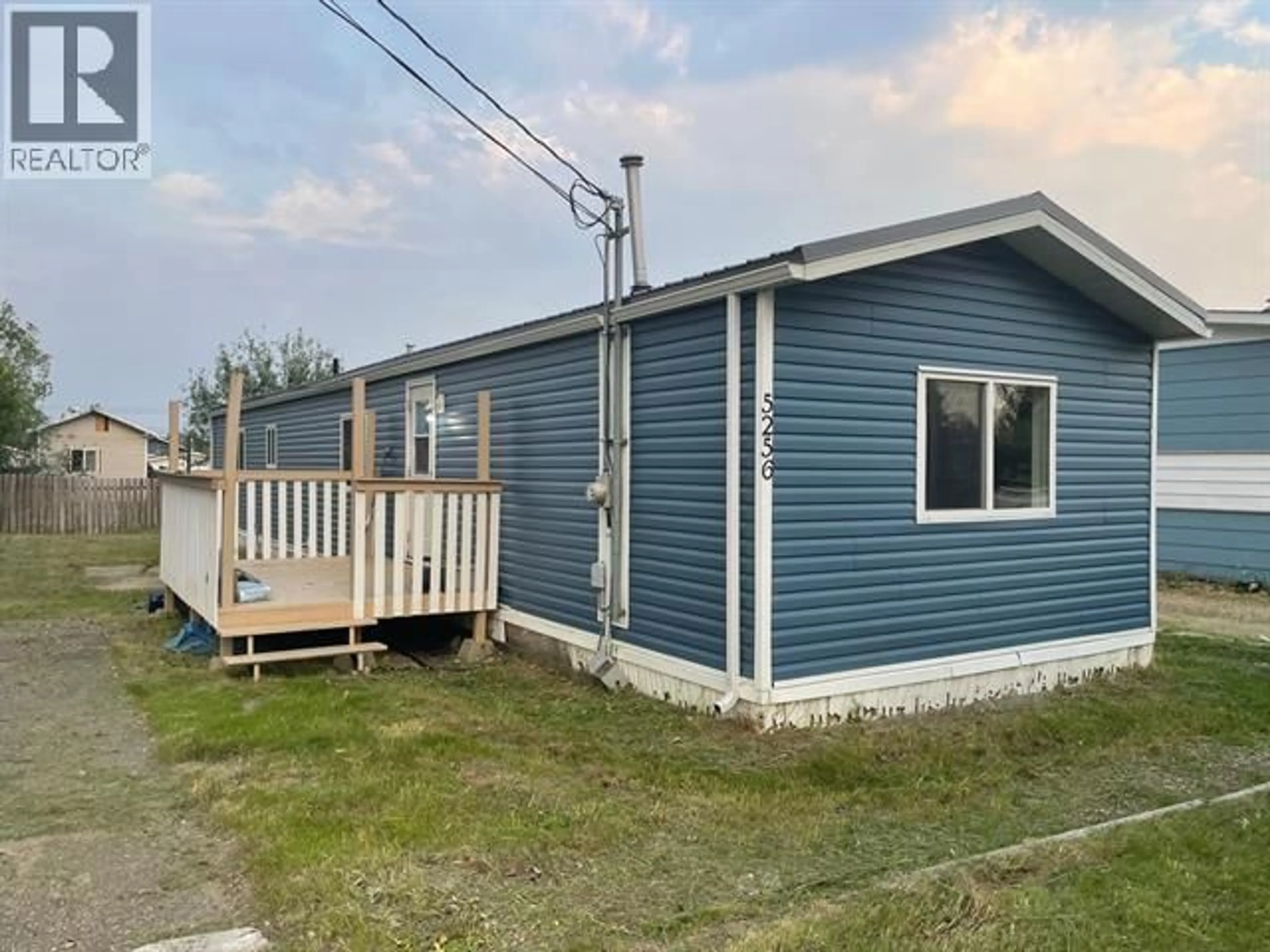 Home with vinyl exterior material, unknown for 5256 42 STREET, Fort Nelson British Columbia V0C1R0