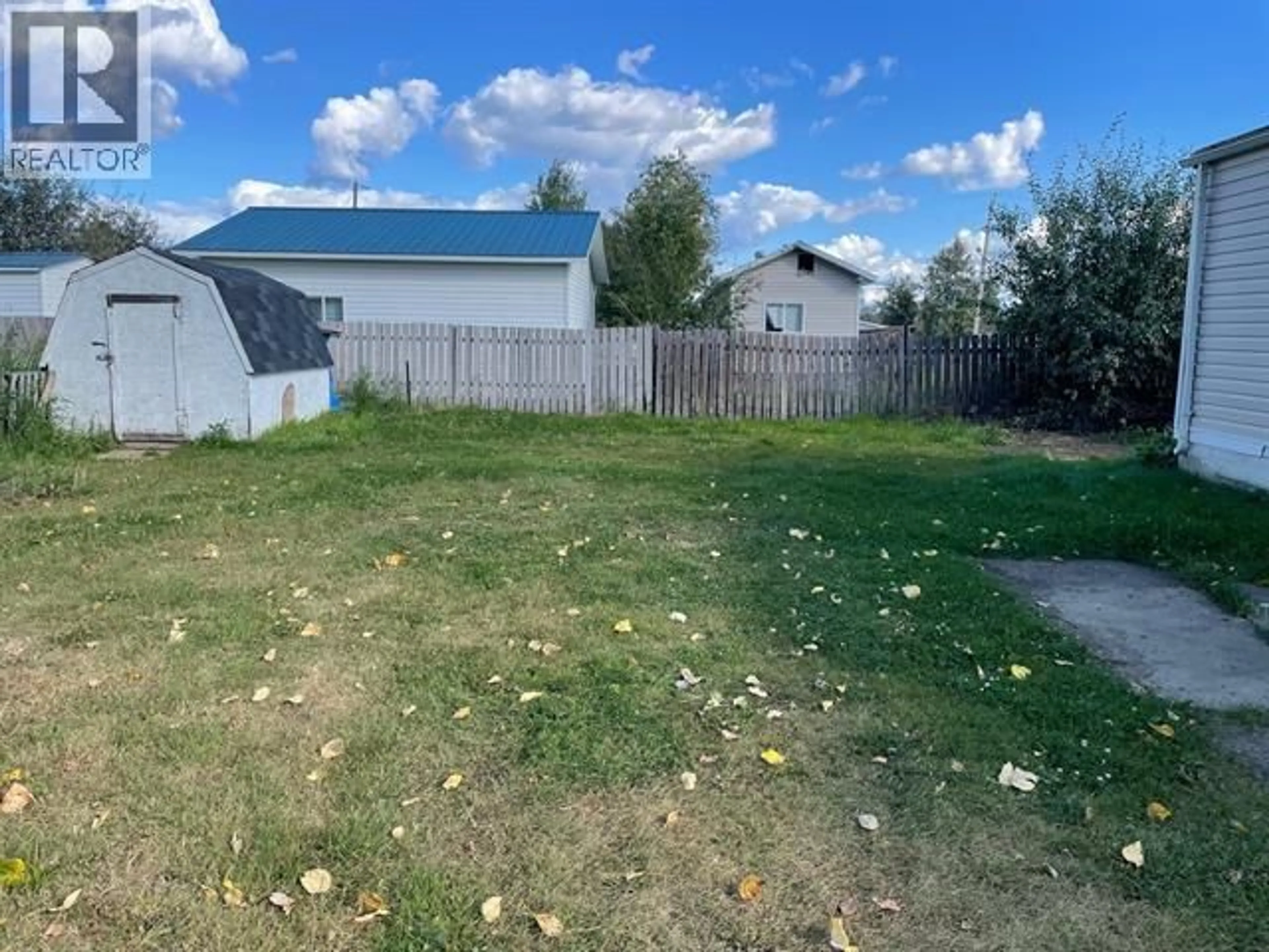 A pic from outside/outdoor area/front of a property/back of a property/a pic from drone, unknown for 5256 42 STREET, Fort Nelson British Columbia V0C1R0