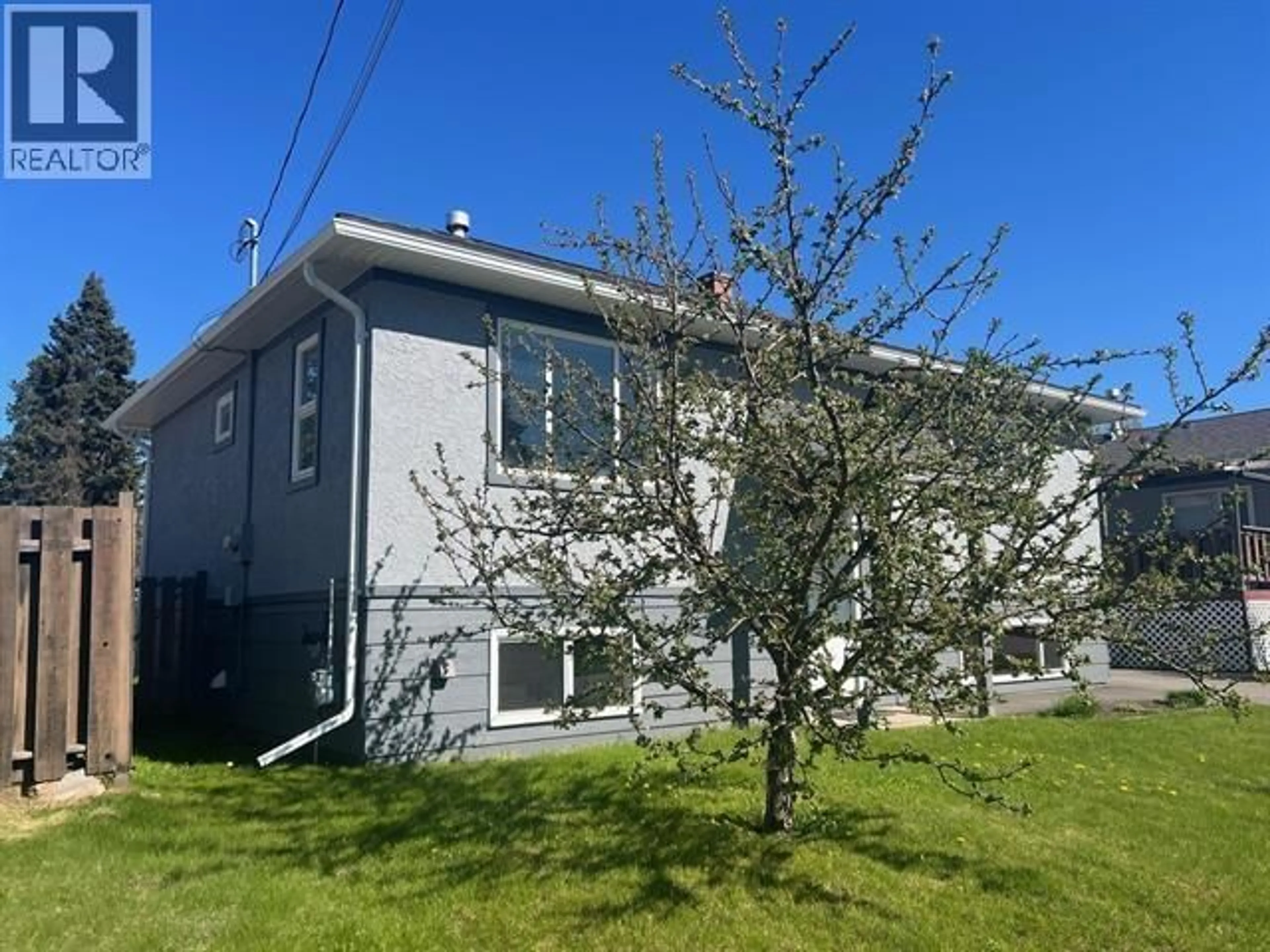 A pic from outside/outdoor area/front of a property/back of a property/a pic from drone, street for 1079 TORONTO STREET, Smithers British Columbia V0J2N0