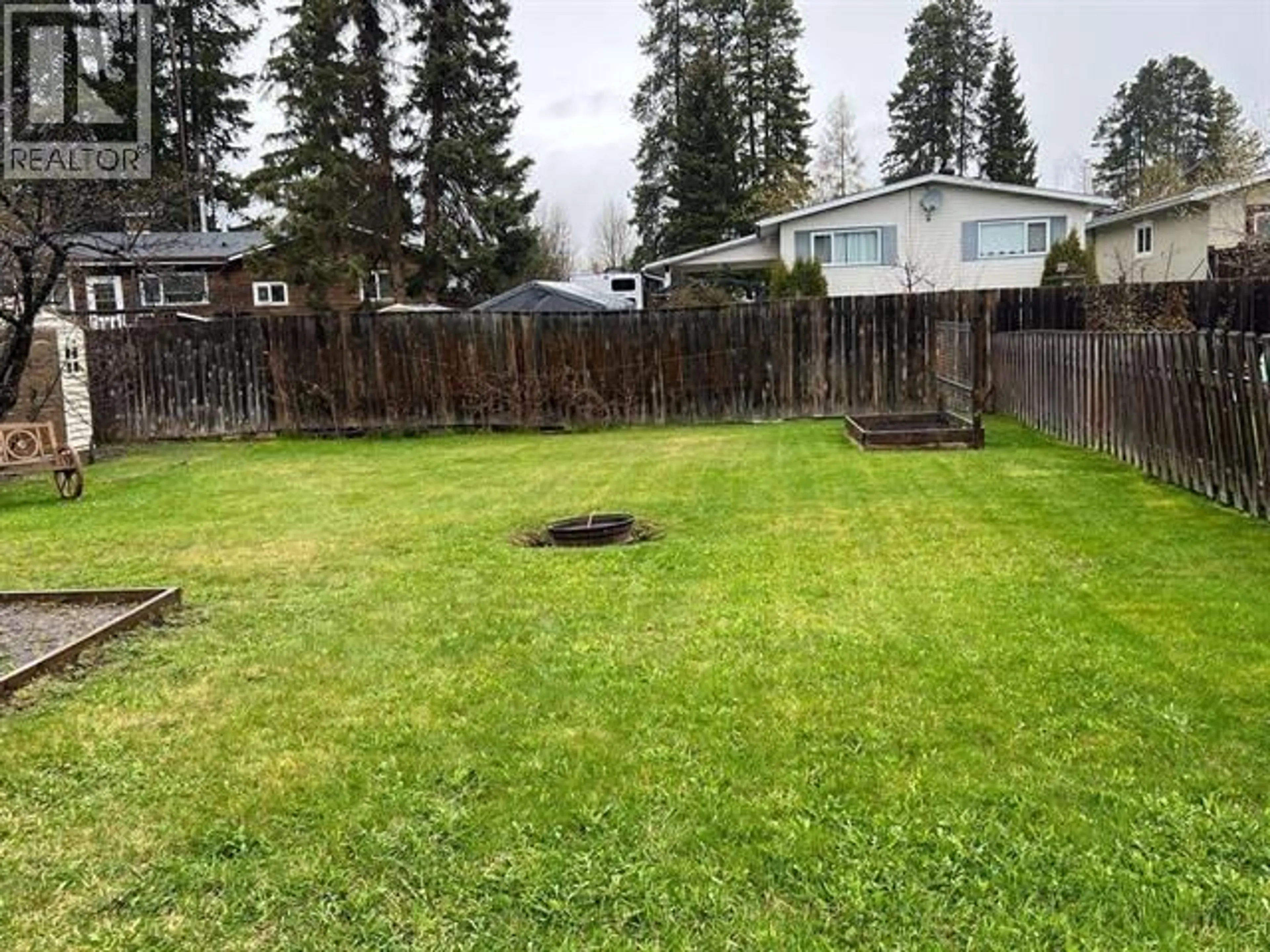A pic from outside/outdoor area/front of a property/back of a property/a pic from drone, forest/trees view for 1079 TORONTO STREET, Smithers British Columbia V0J2N0