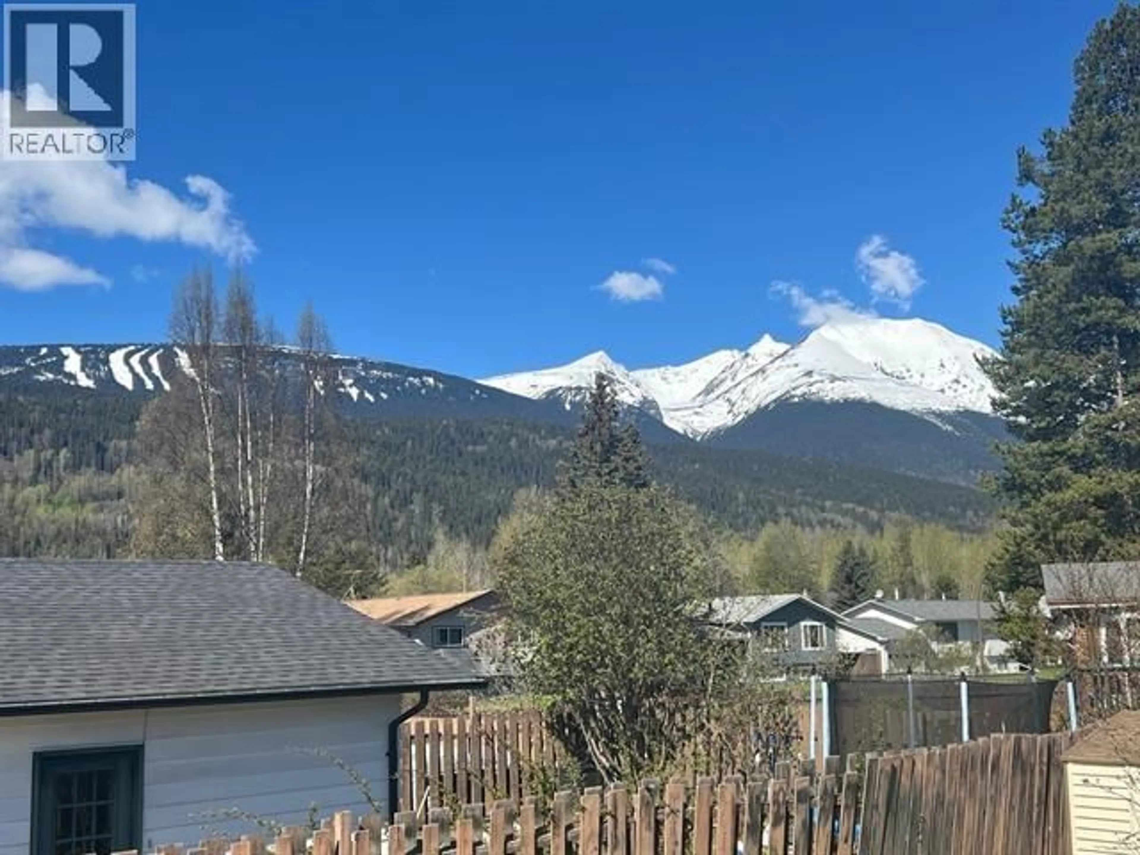 A pic from outside/outdoor area/front of a property/back of a property/a pic from drone, mountain view for 1079 TORONTO STREET, Smithers British Columbia V0J2N0