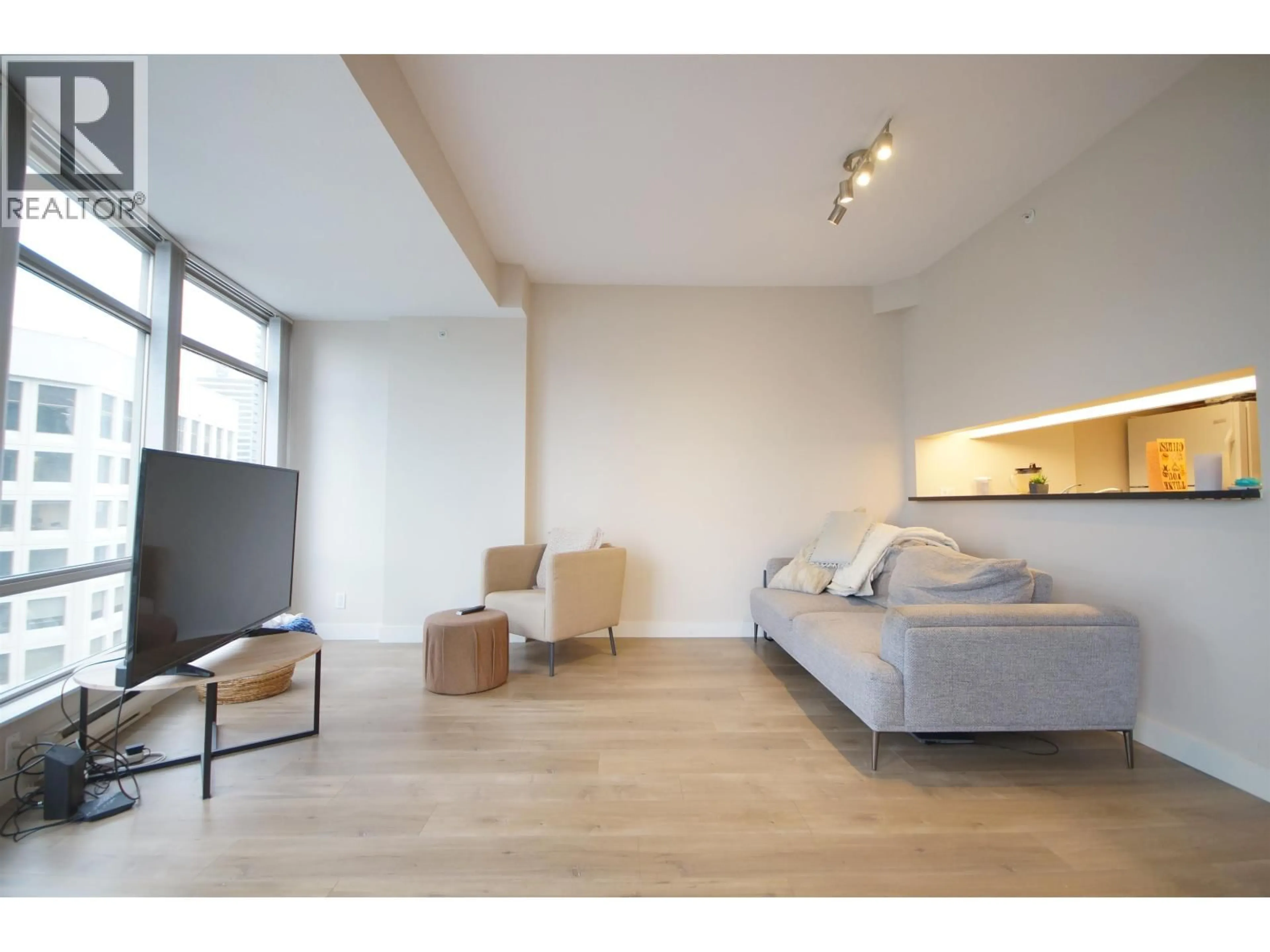 Living room with furniture, wood/laminate floor for 2205 - 1200 ALBERNI STREET, Vancouver British Columbia V6E1A6