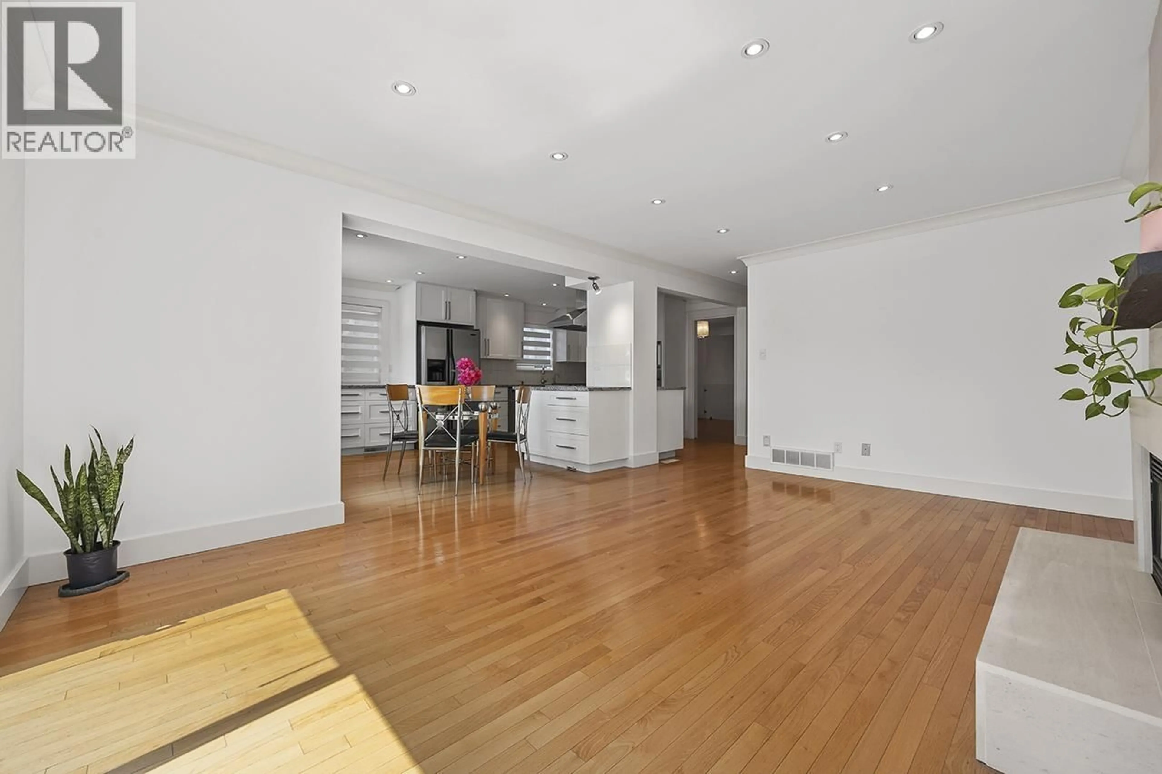 Open concept kitchen, wood/laminate floor for 3558 32ND AVENUE, Vancouver British Columbia V6S1Z2