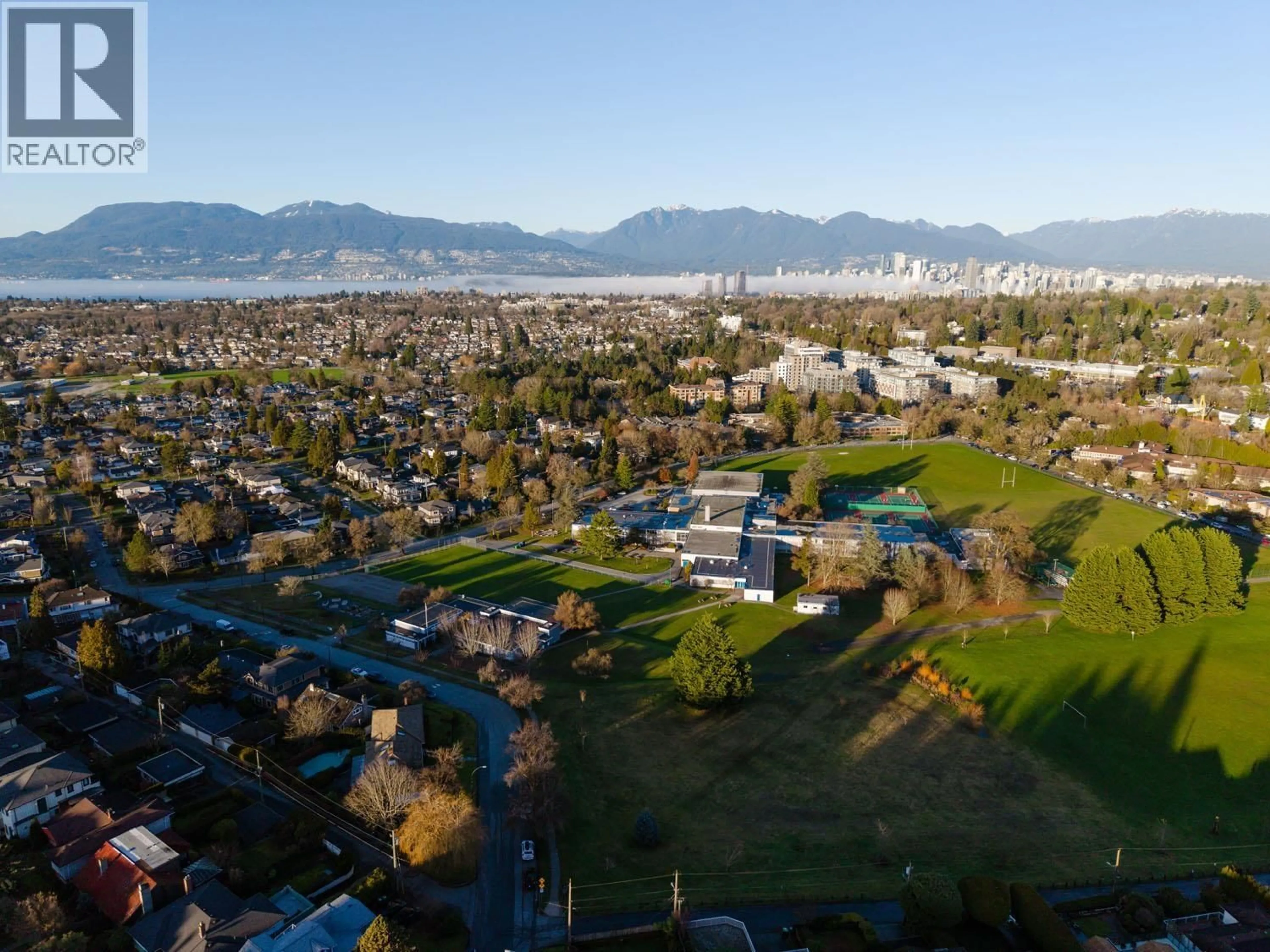 A pic from outside/outdoor area/front of a property/back of a property/a pic from drone, mountain view for 2296 32ND AVENUE, Vancouver British Columbia V6L2B2