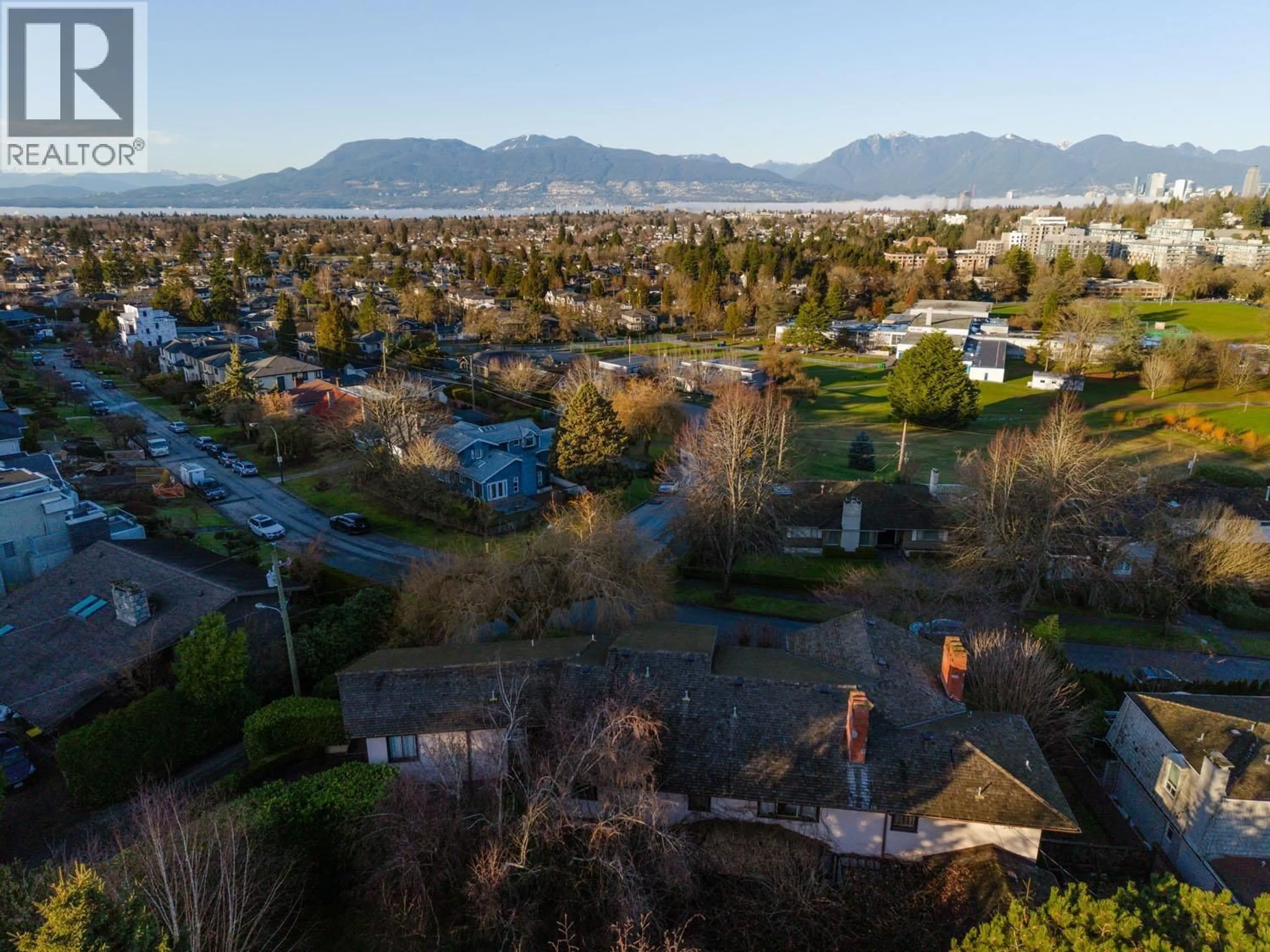 A pic from outside/outdoor area/front of a property/back of a property/a pic from drone, mountain view for 2296 32ND AVENUE, Vancouver British Columbia V6L2B2