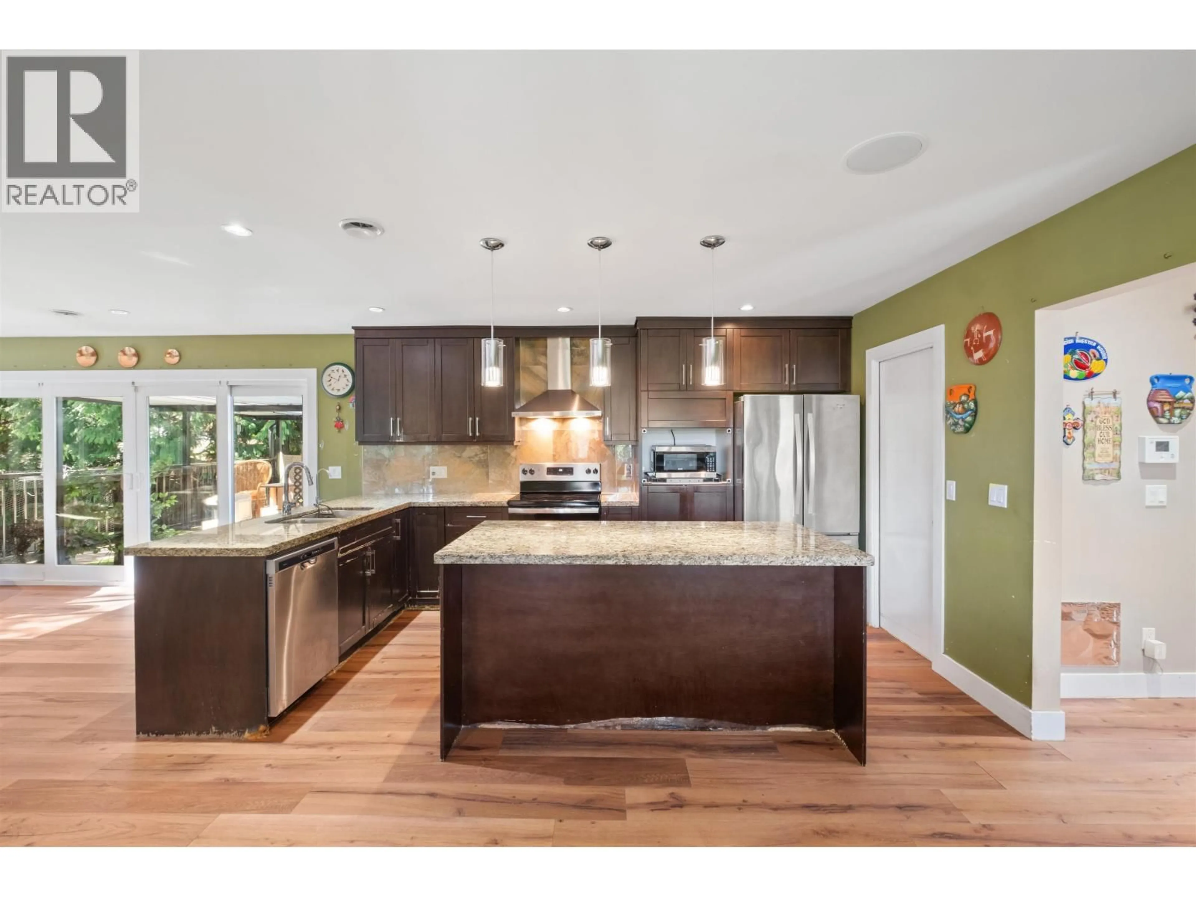 Open concept kitchen, wood/laminate floor for 1329 APPIN ROAD, North Vancouver British Columbia V7J2T4