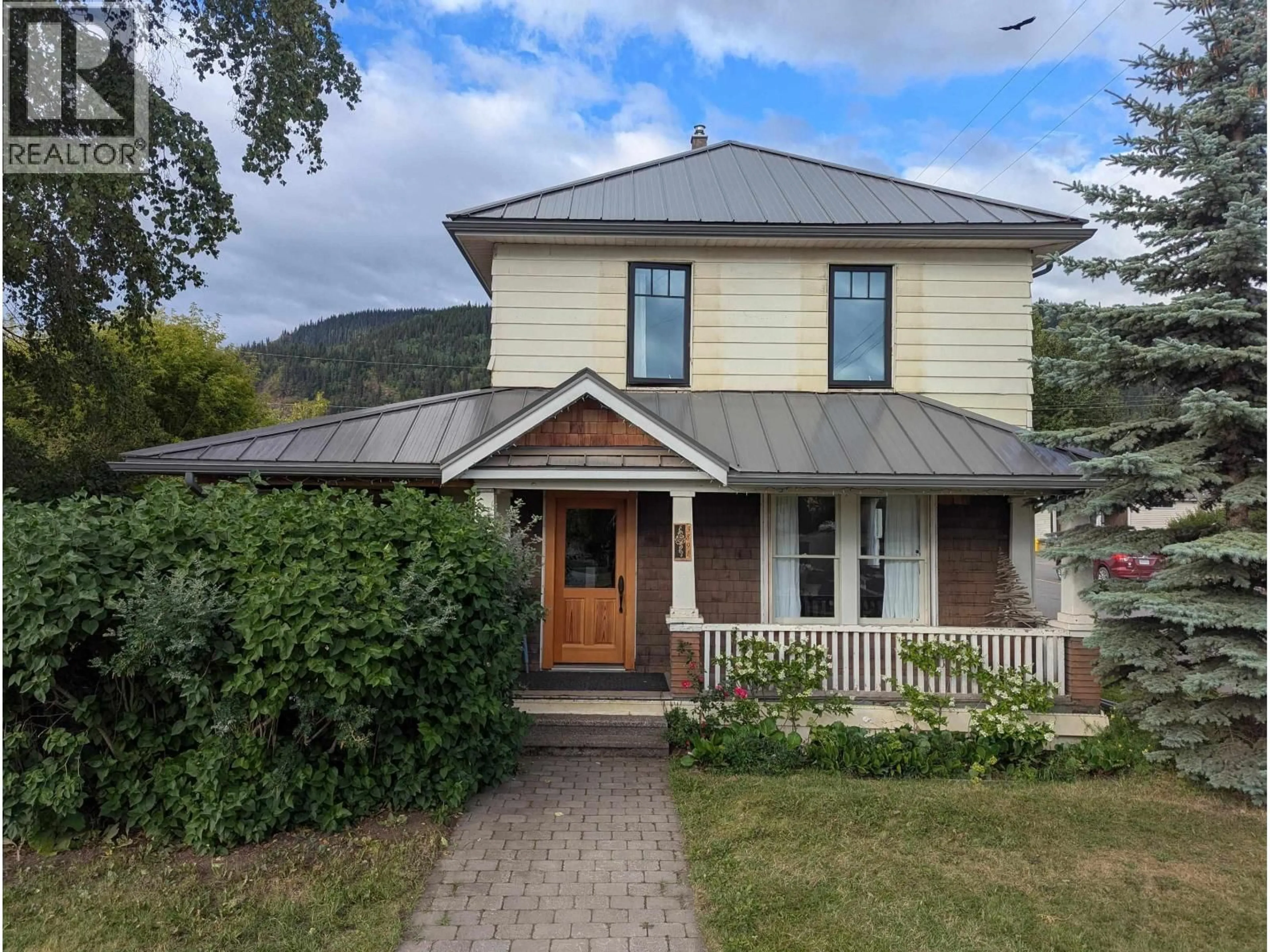 Home with vinyl exterior material, street for 3891 BROADWAY AVENUE, Smithers British Columbia V0J2N0