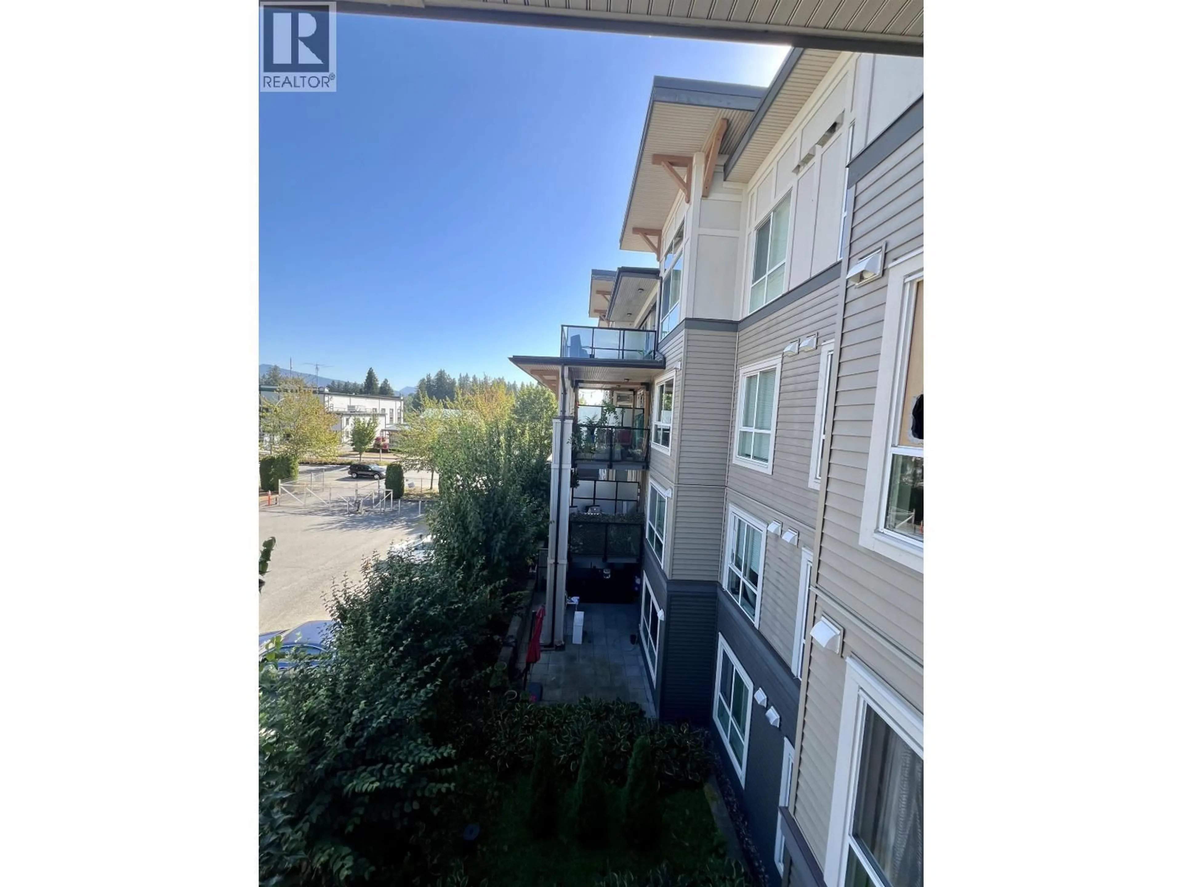 A pic from outside/outdoor area/front of a property/back of a property/a pic from drone, water/lake/river/ocean view for 302 - 12409 HARRIS ROAD, Pitt Meadows British Columbia V3Y0E7