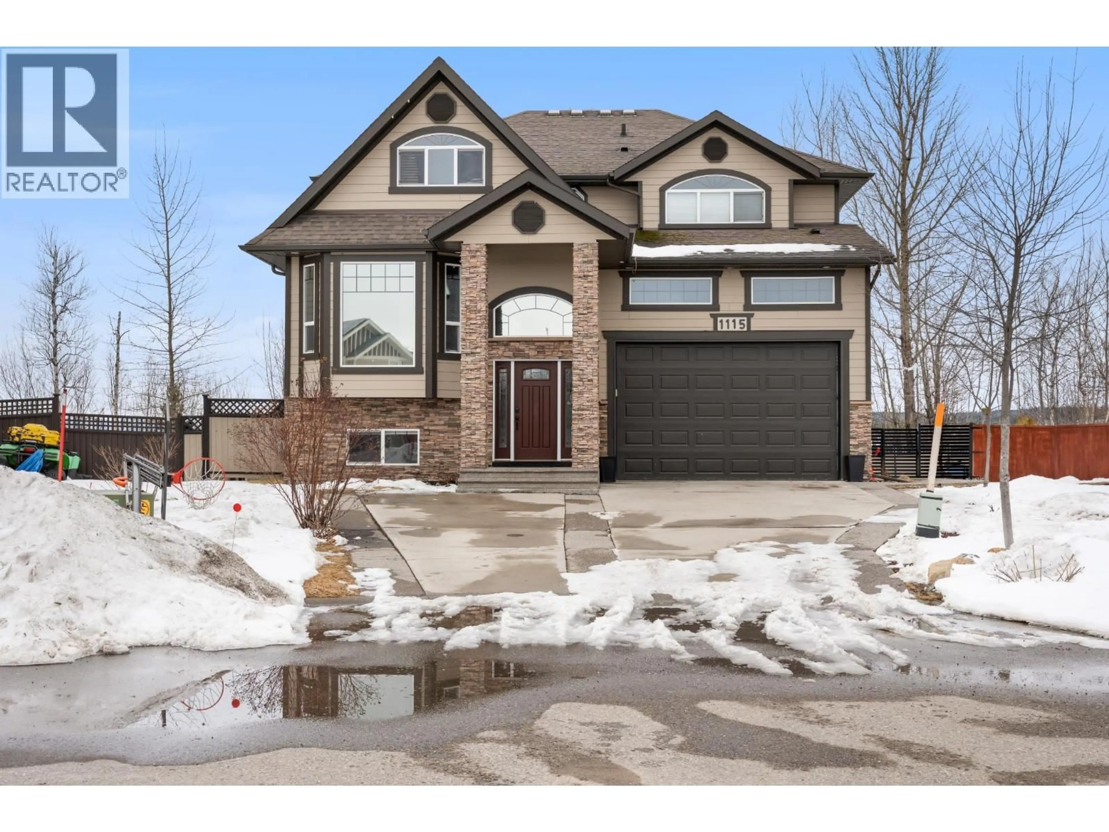 Home with brick exterior material, street for 1115 ABRUZZI PLACE, Prince George British Columbia V2N0B7