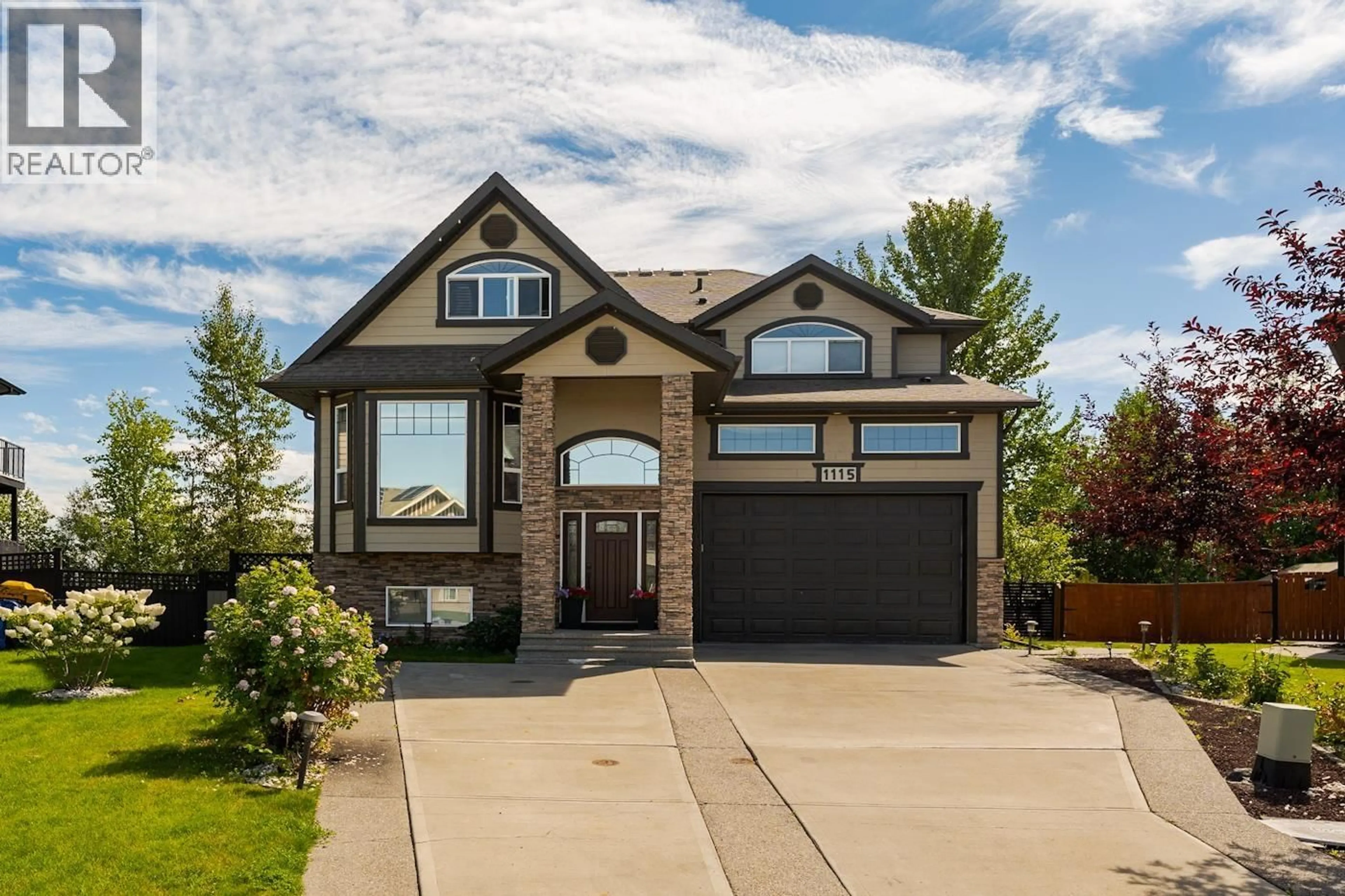 Home with brick exterior material, street for 1115 ABRUZZI PLACE, Prince George British Columbia V2N0B7