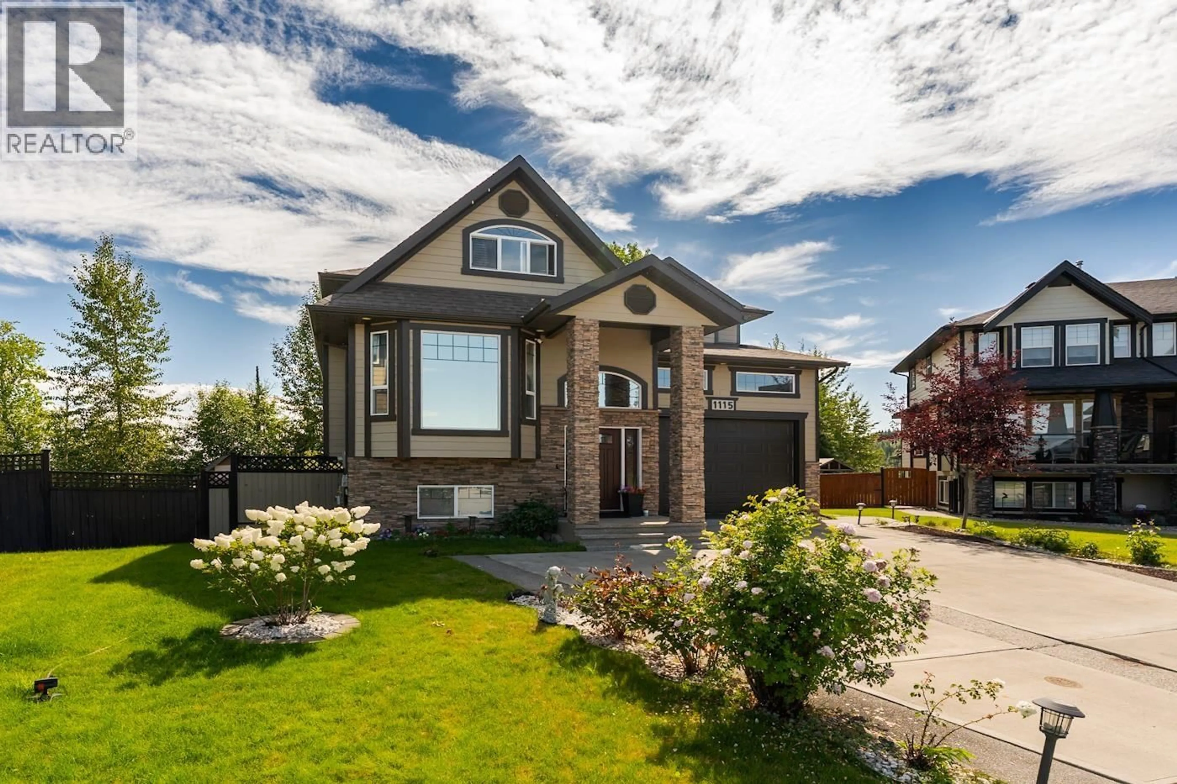 Home with brick exterior material, street for 1115 ABRUZZI PLACE, Prince George British Columbia V2N0B7