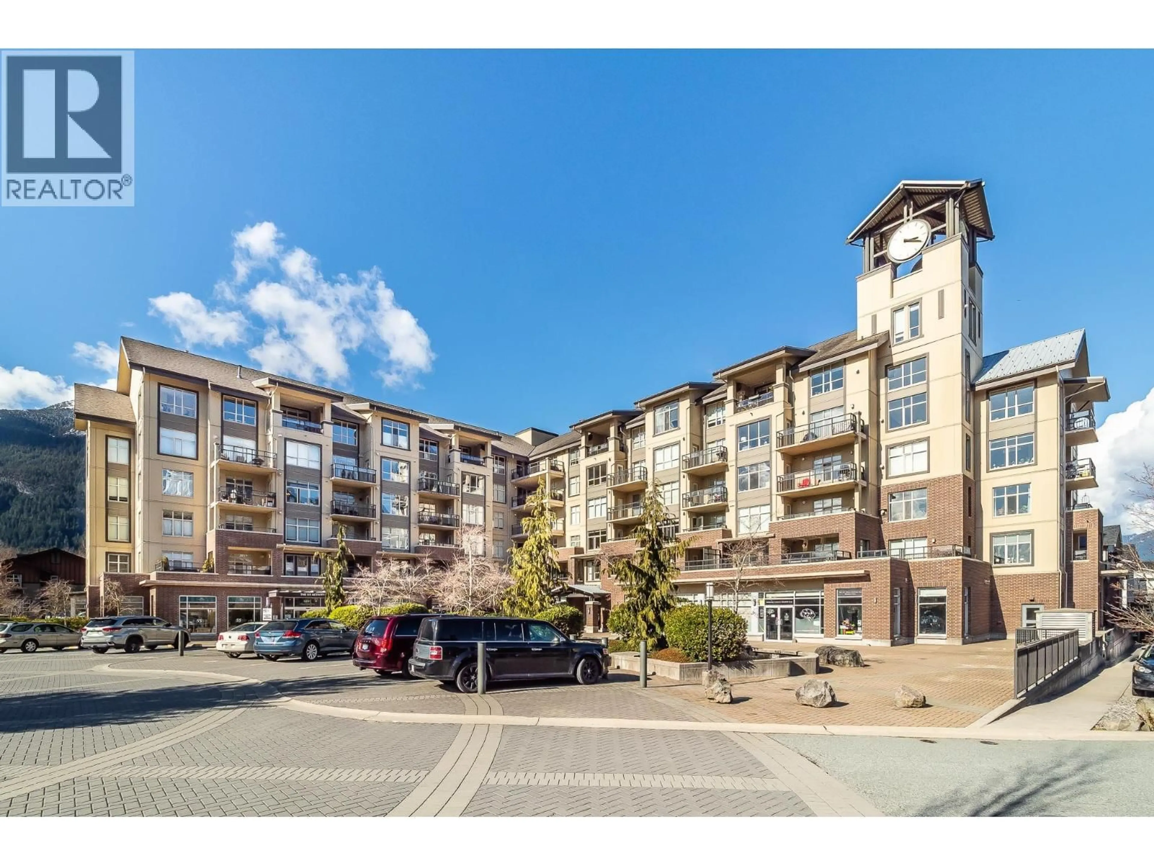 A pic from outside/outdoor area/front of a property/back of a property/a pic from drone, street for 421 - 1211 VILLAGE GREEN WAY, Squamish British Columbia V8B0R7