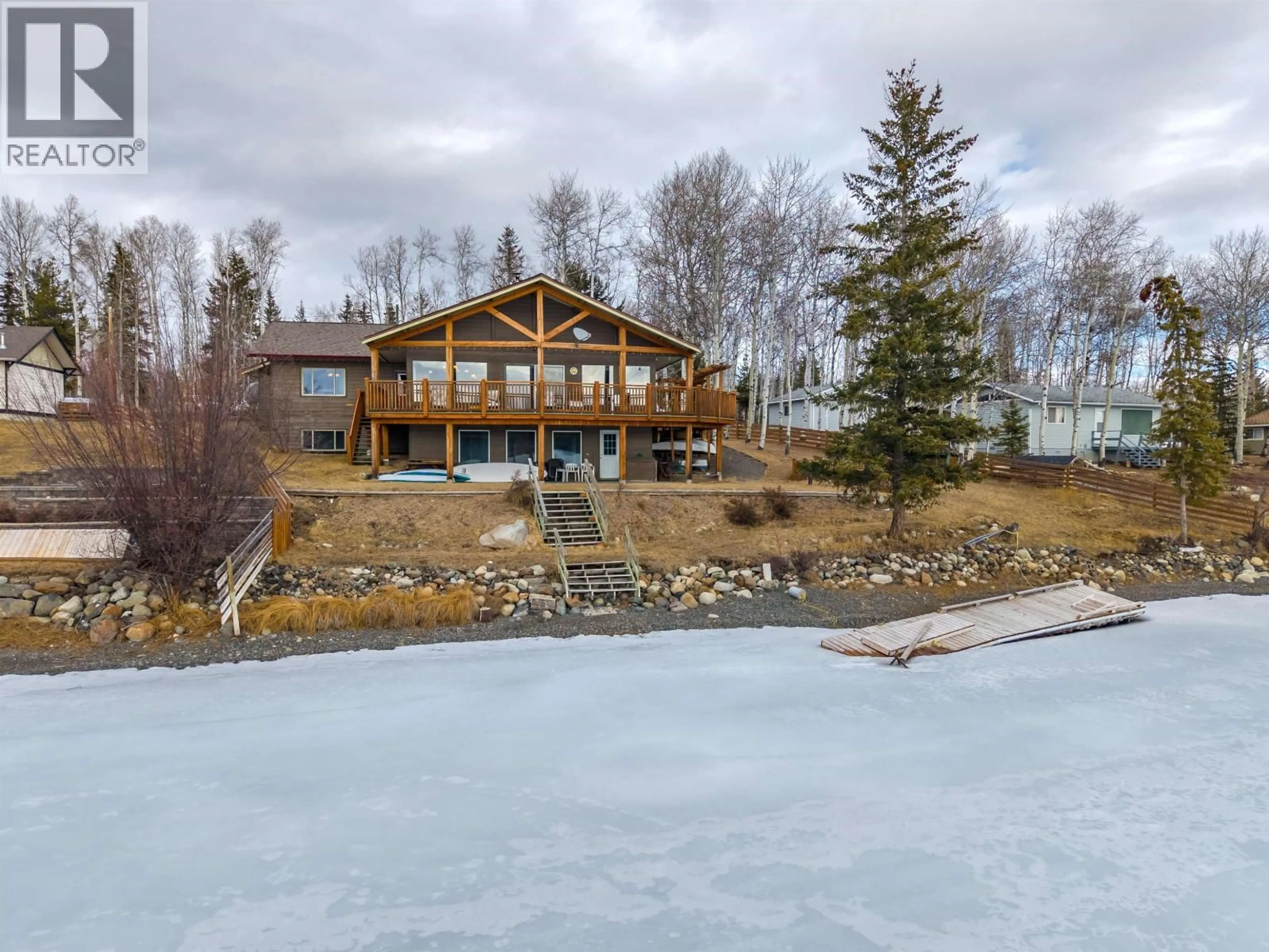 A pic from outside/outdoor area/front of a property/back of a property/a pic from drone, water/lake/river/ocean view for 6410 FOX CRESCENT, Lone Butte British Columbia V0K2K1