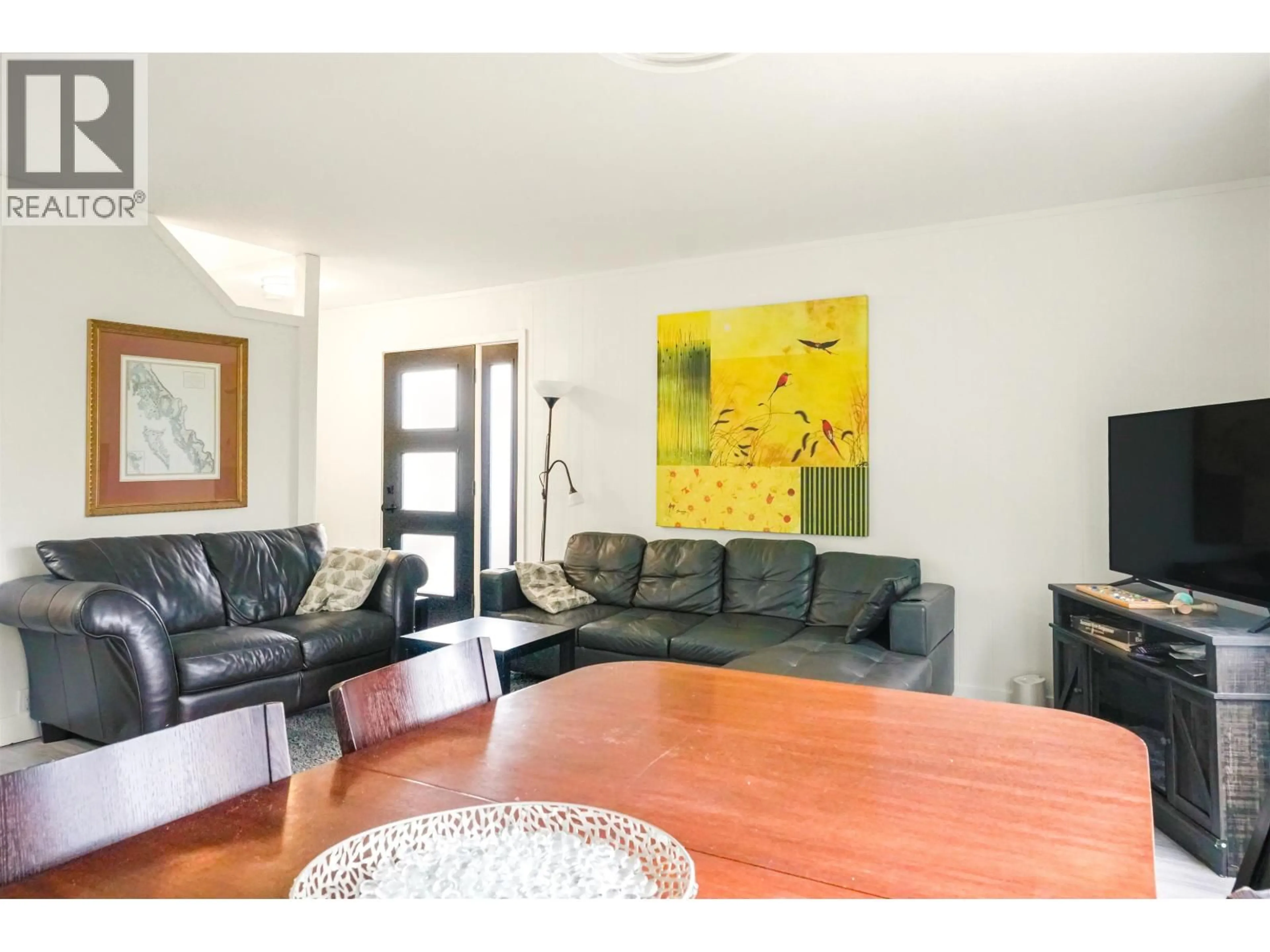 Living room with furniture, wood/laminate floor for 87 SWALLOW STREET, Kitimat British Columbia V8C1K6