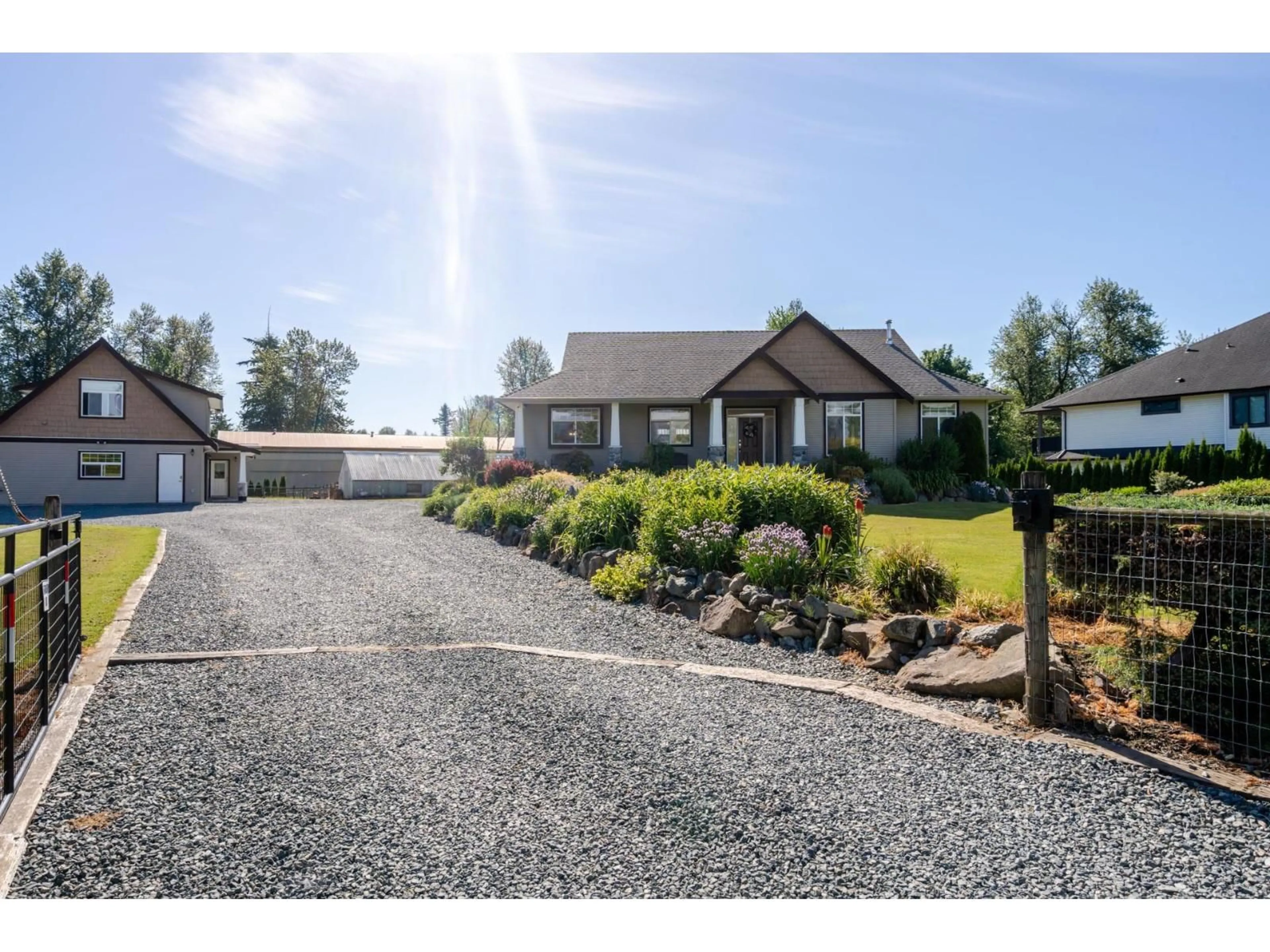 A pic from outside/outdoor area/front of a property/back of a property/a pic from drone, street for 5728 BRADNER ROAD, Abbotsford British Columbia V4X2P1