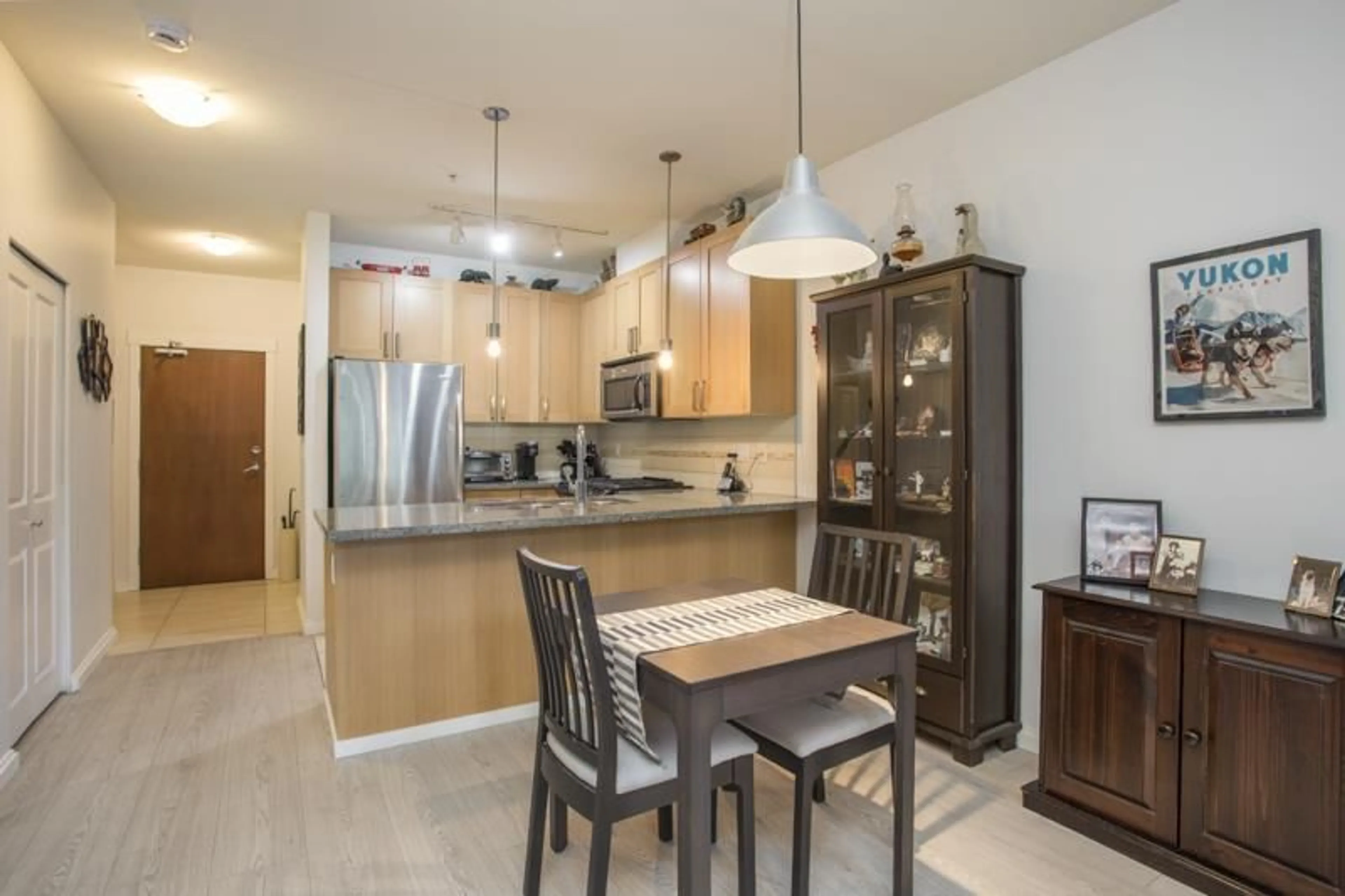 Open concept kitchen, wood/laminate floor for 223 - 15988 26 AVENUE, Surrey British Columbia V3Z5K3