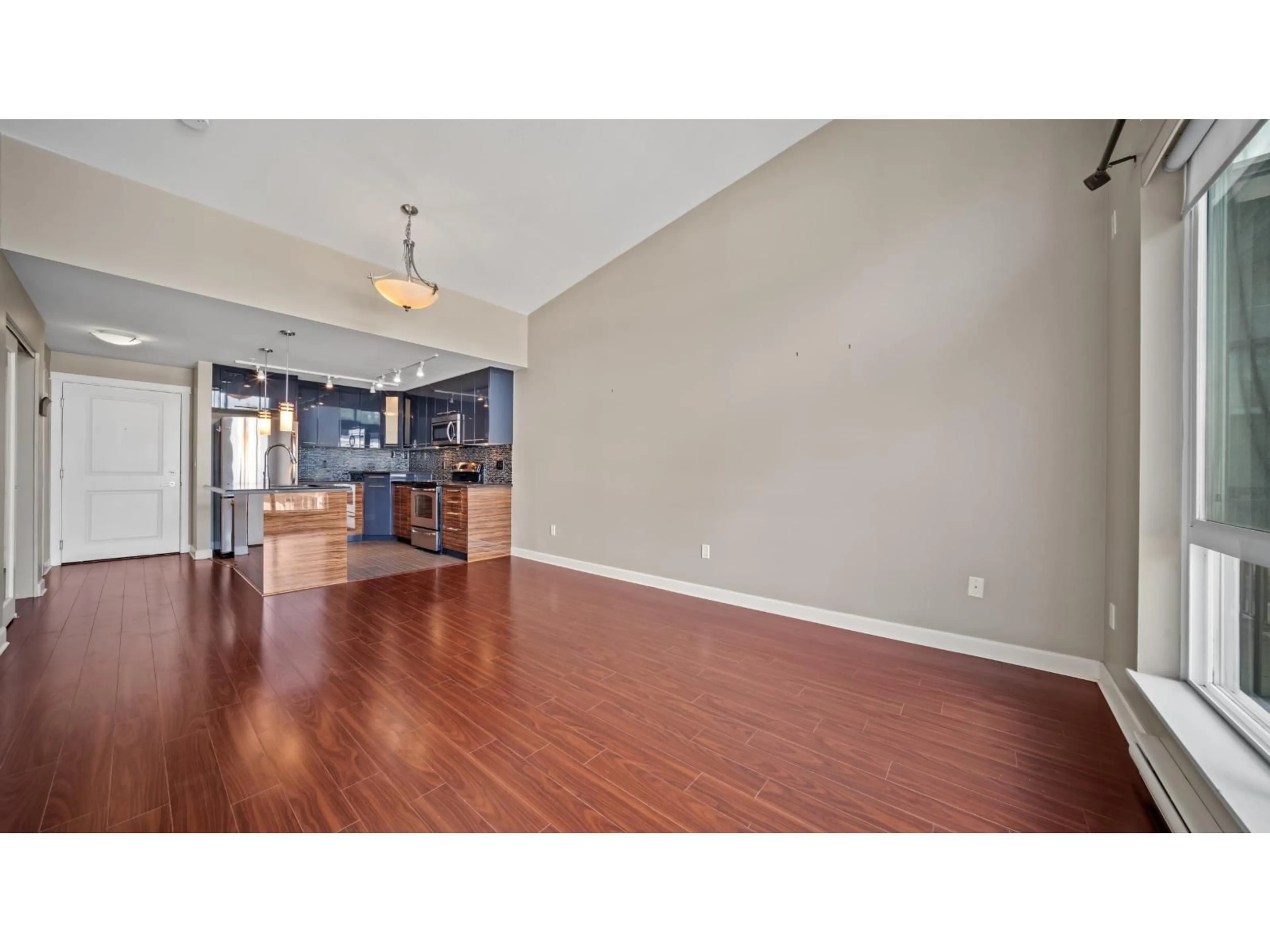 Open concept kitchen, wood/laminate floor for 426 - 12039 64 AVENUE, Surrey British Columbia V3W0R7