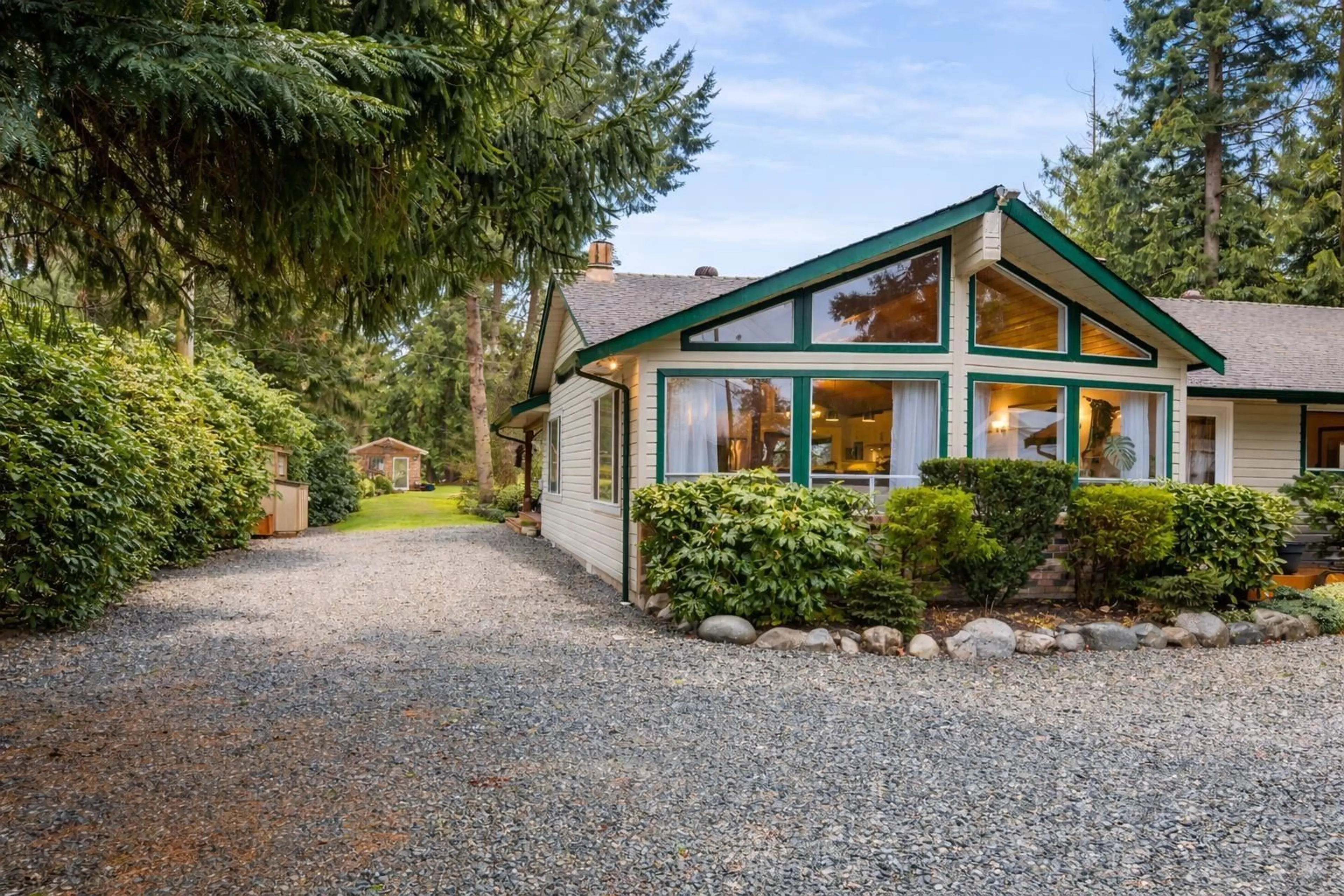 Home with vinyl exterior material, street for 22558 OLD YALE ROAD, Langley British Columbia V2Z2V4