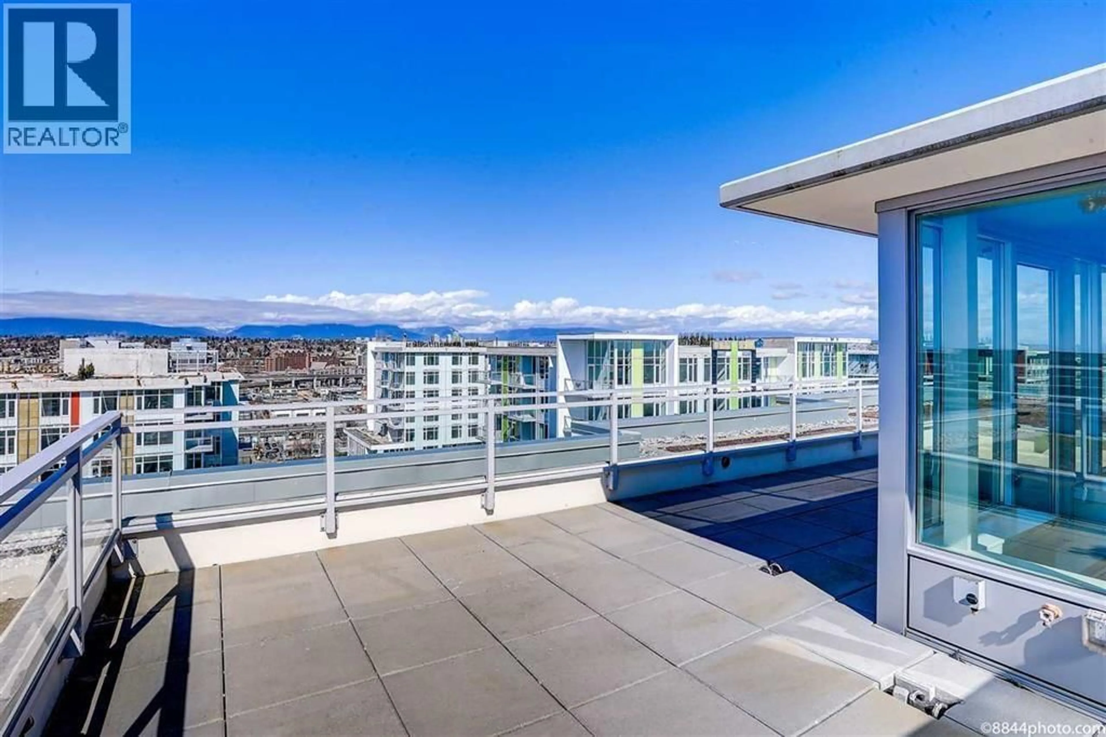 Balcony in the apartment, city buildings view from balcony for 1703 - 8688 HAZELBRIDGE WAY, Richmond British Columbia V6X0R6