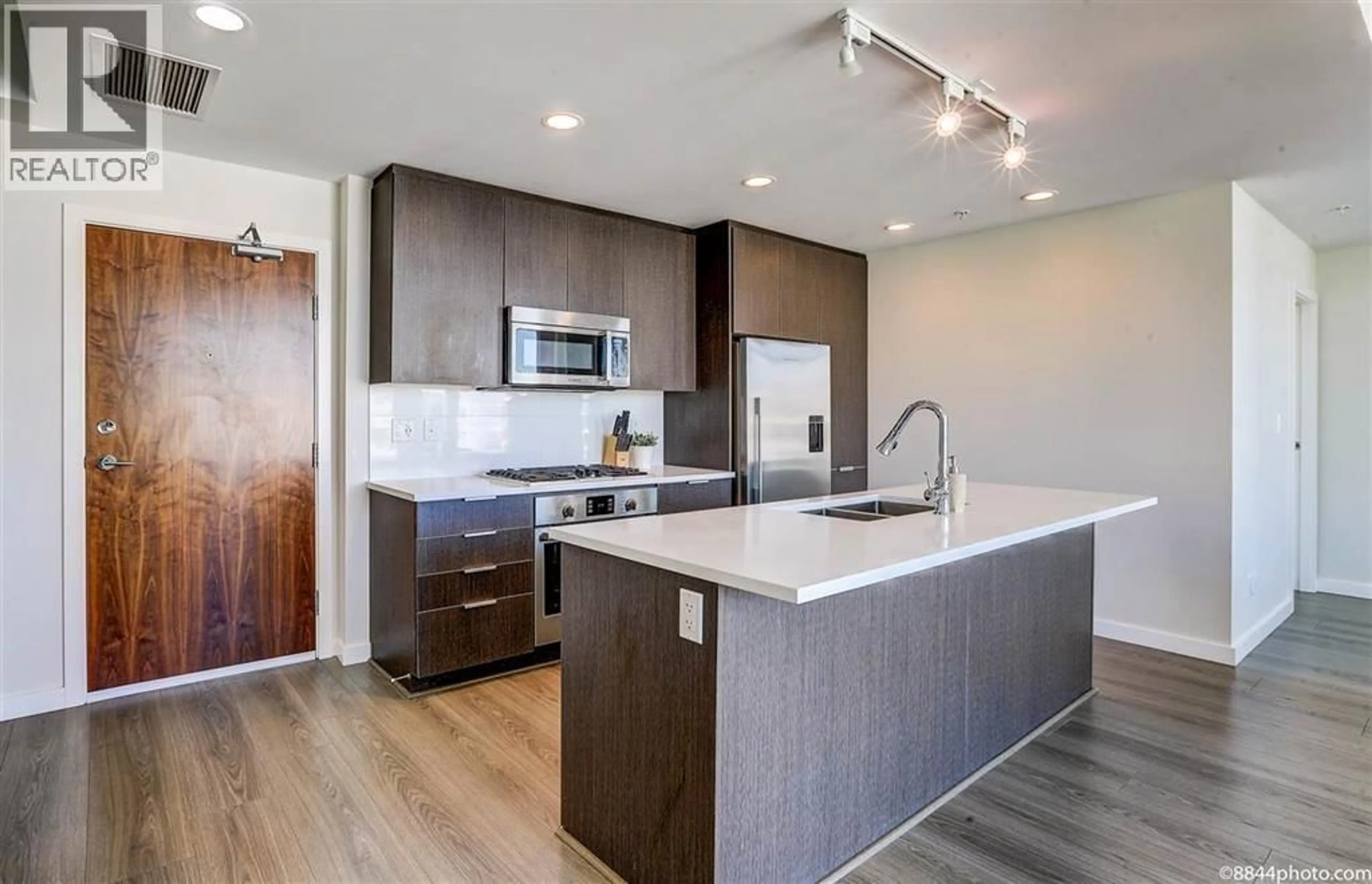 Open concept kitchen, unknown for 1703 - 8688 HAZELBRIDGE WAY, Richmond British Columbia V6X0R6