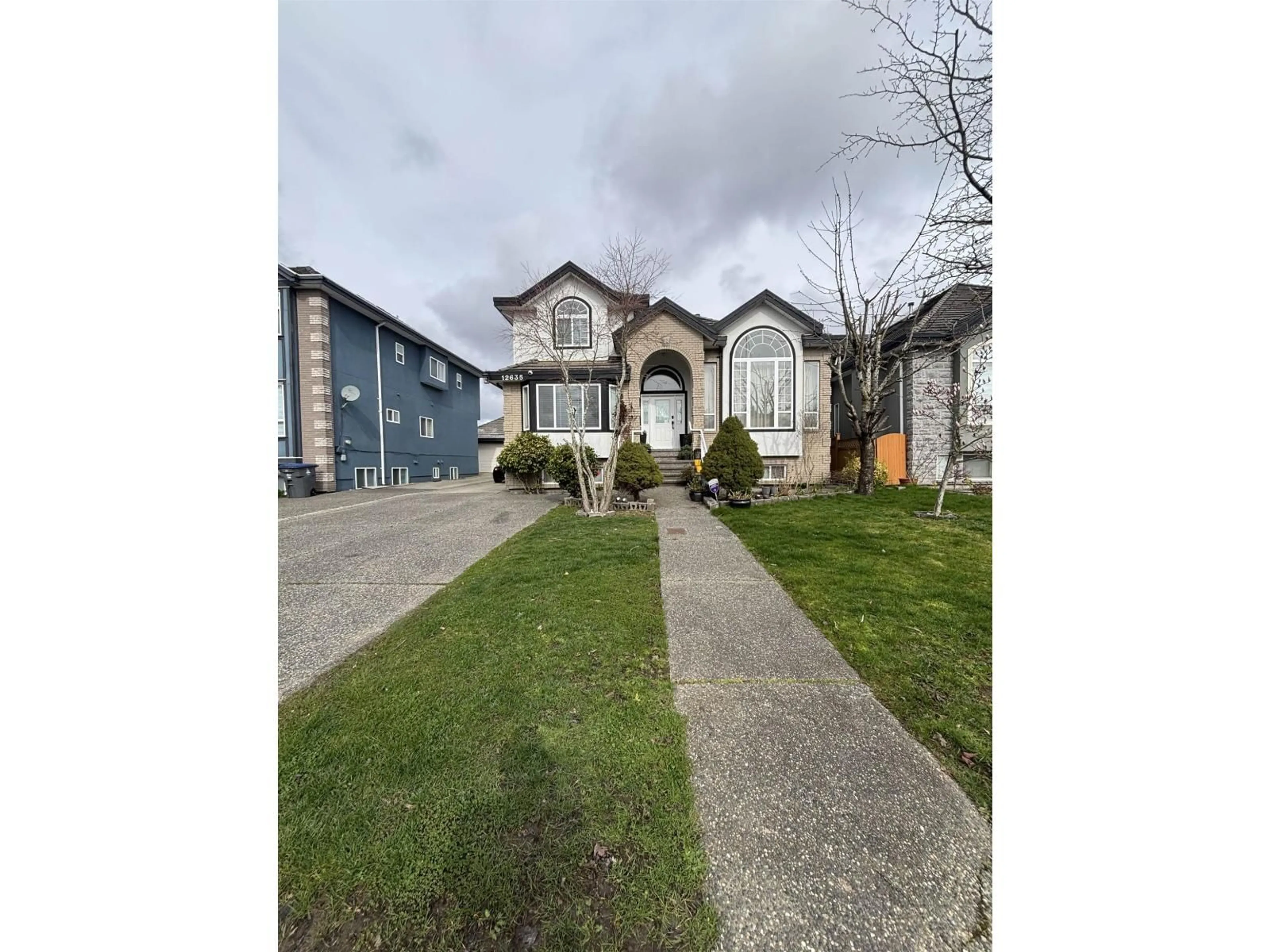 A pic from outside/outdoor area/front of a property/back of a property/a pic from drone, street for 12635 67A AVENUE, Surrey British Columbia V3W1G3