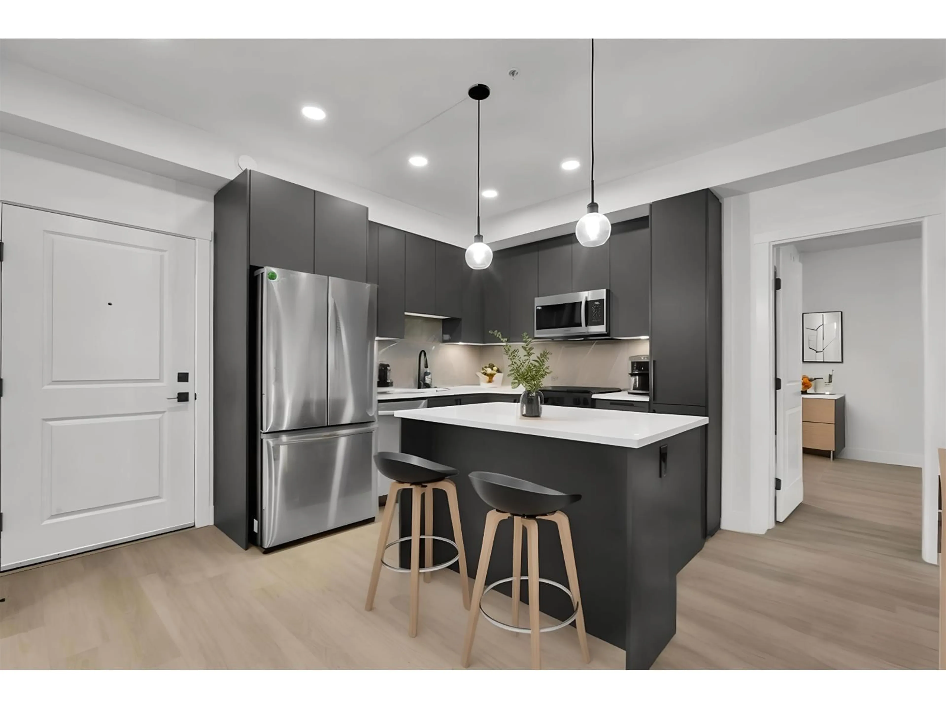 Open concept kitchen, unknown for 102 - 3480 146A STREET, Surrey British Columbia V4P0H6
