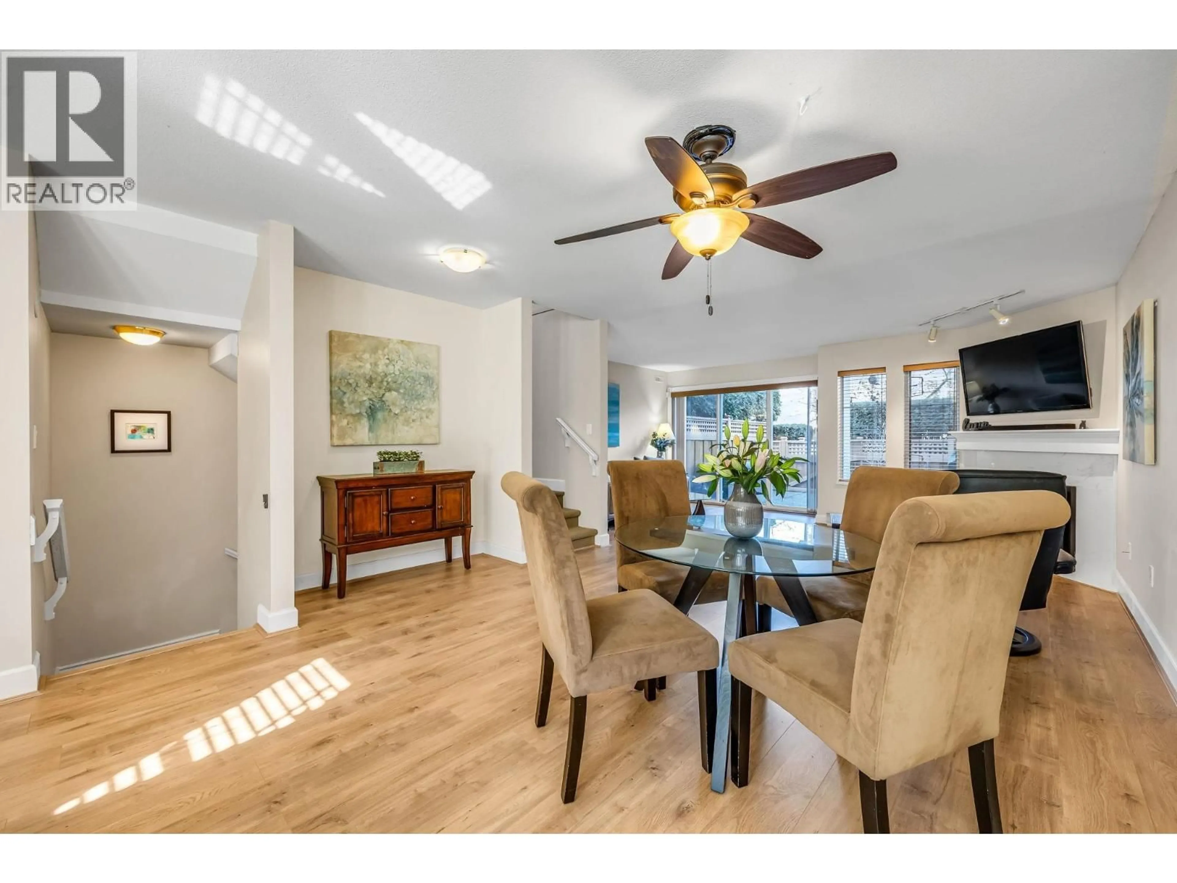 Dining room, wood/laminate floor for 103 - 245 15TH STREET, North Vancouver British Columbia V7M1S3