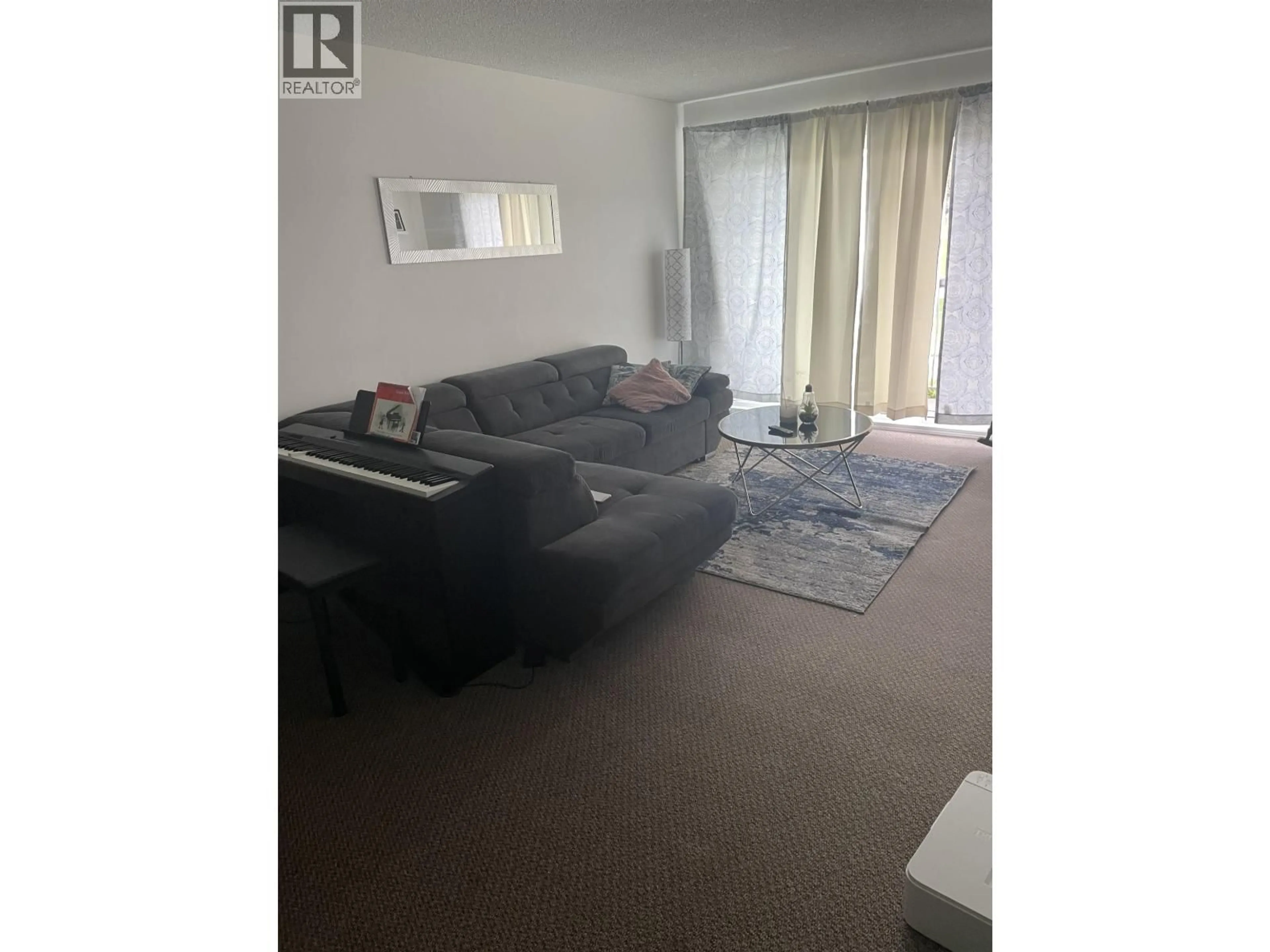 Living room with furniture, floor is not visible for 216 - 4931 WALSH AVENUE, Terrace British Columbia V8G1Z1