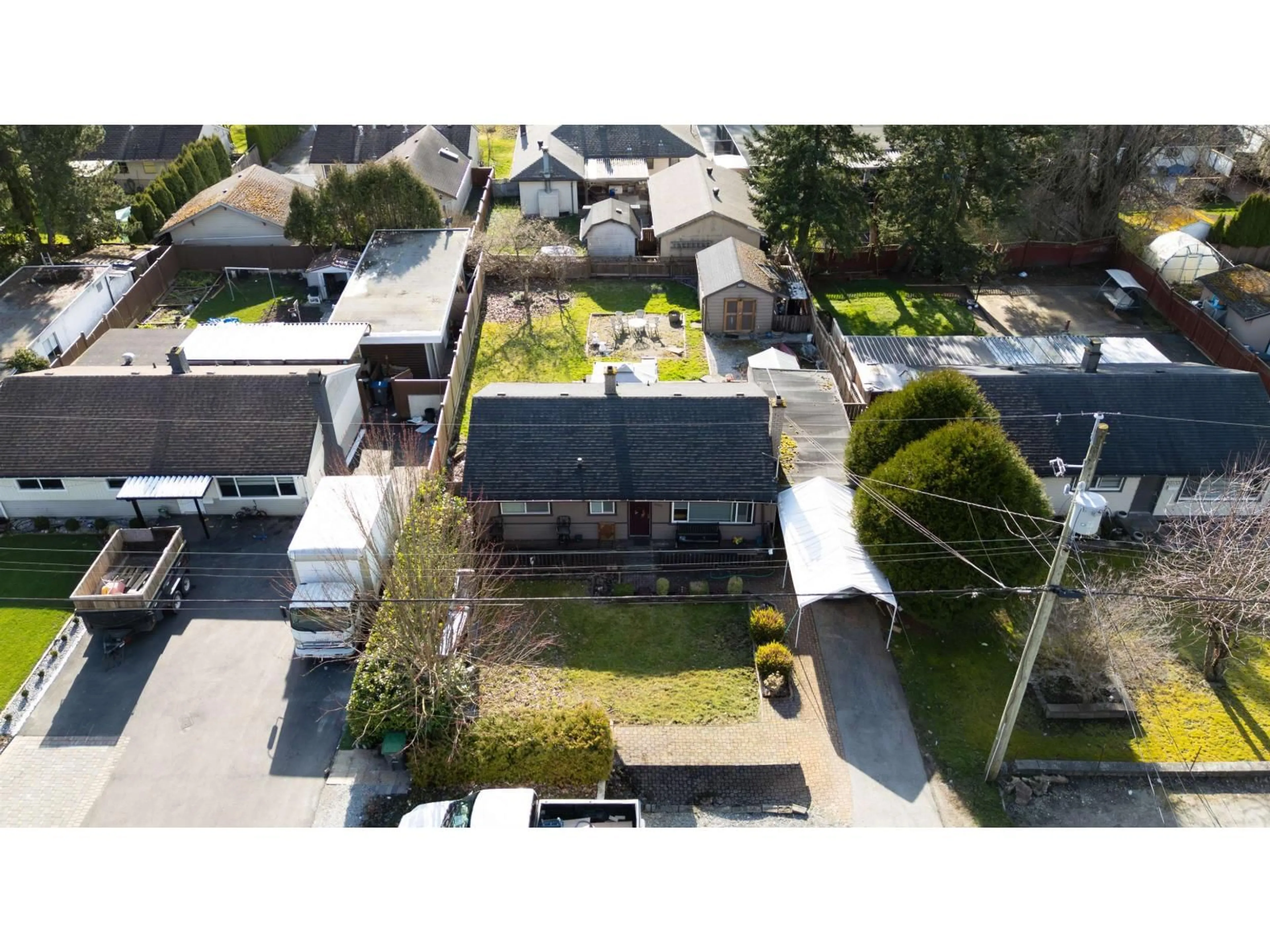 A pic from outside/outdoor area/front of a property/back of a property/a pic from drone, street for 10167 HELEN DRIVE, Surrey British Columbia V3V3B4