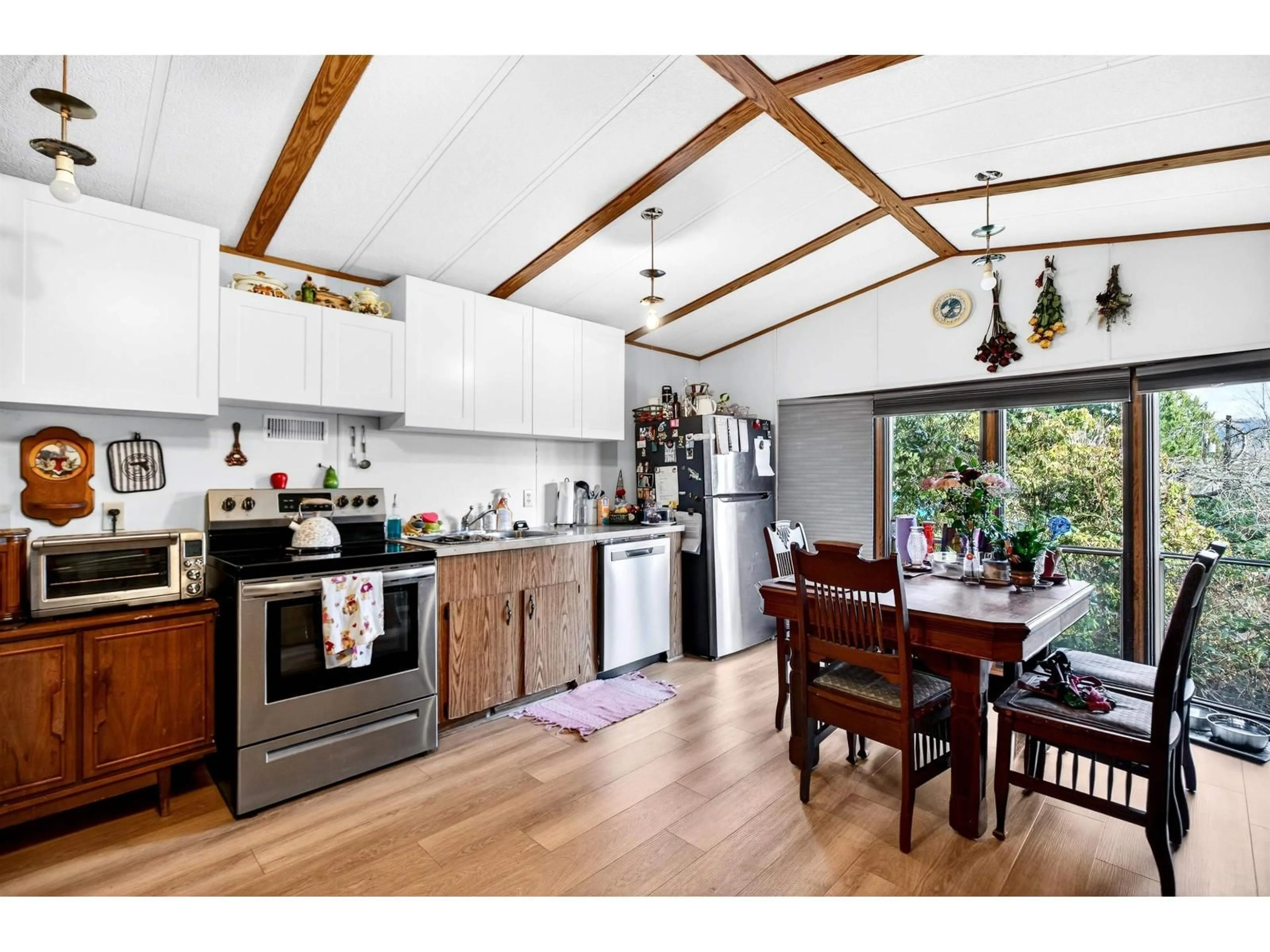 Open concept kitchen, wood/laminate floor for 21 - 10221 WILSON STREET, Mission British Columbia V2V6H5