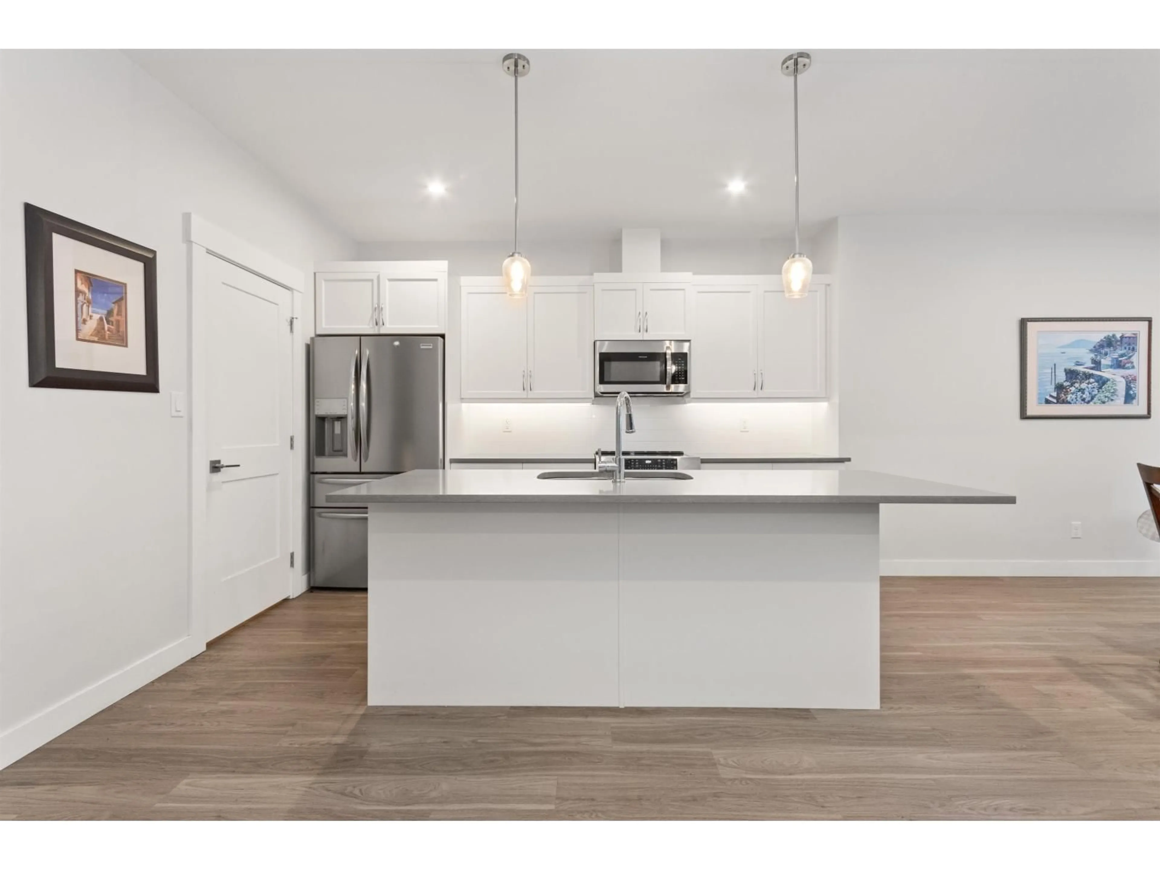 Open concept kitchen, wood/laminate floor for 65553 SKYLARK LANE, Hope British Columbia V0X1L1