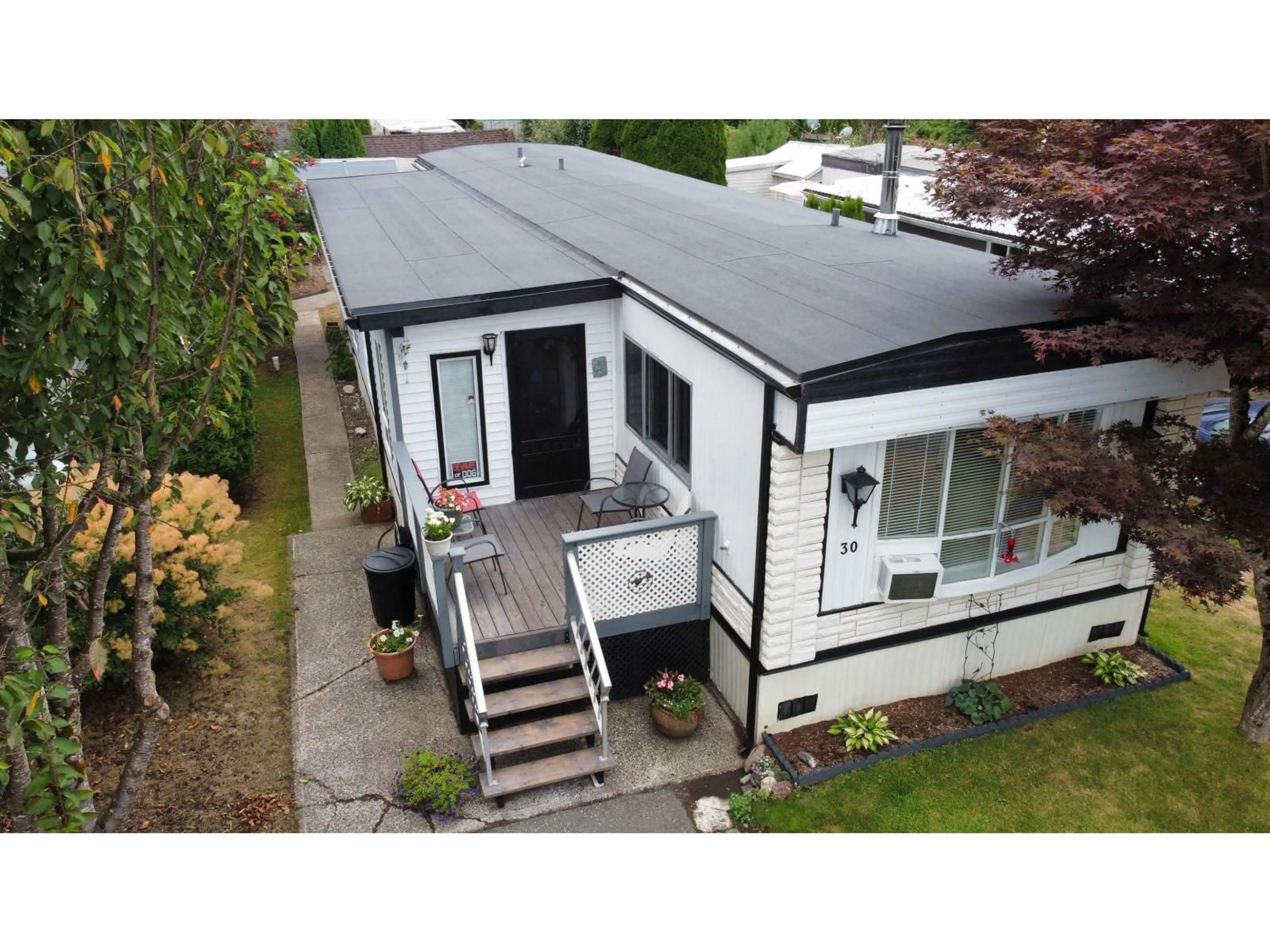 A pic from outside/outdoor area/front of a property/back of a property/a pic from drone, building for 30 - 46484 CHILLIWACK LAKE ROAD, Chilliwack British Columbia V2R3R7