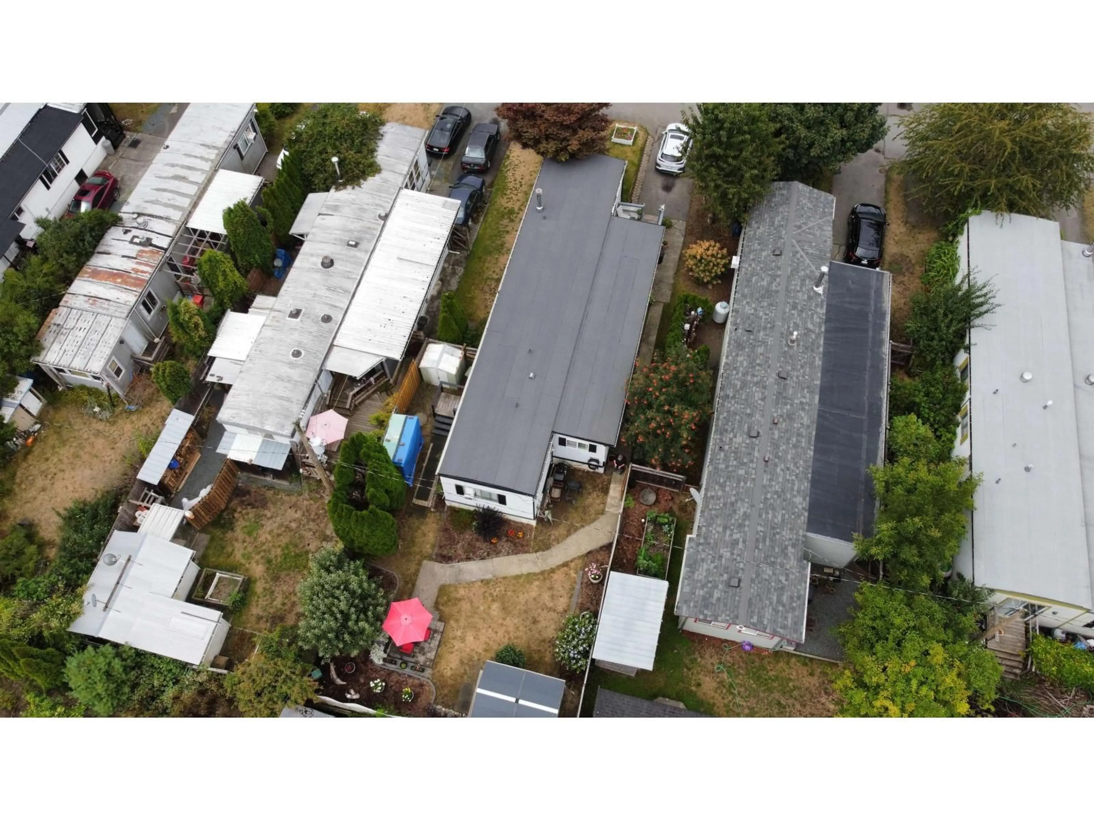 A pic from outside/outdoor area/front of a property/back of a property/a pic from drone, street for 30 - 46484 CHILLIWACK LAKE ROAD, Chilliwack British Columbia V2R3R7