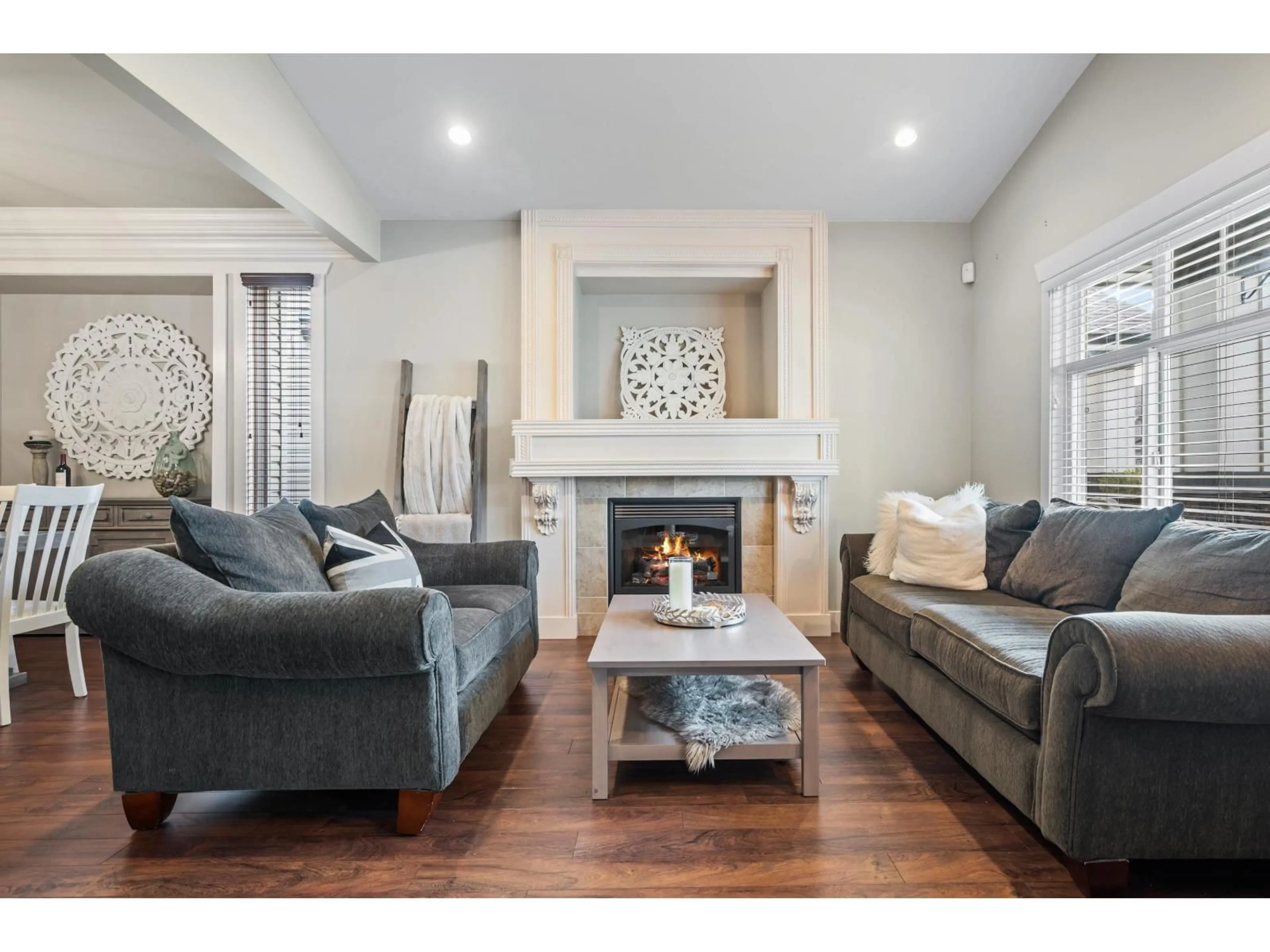 Living room with furniture, wood/laminate floor for 21027 83A AVENUE, Langley British Columbia V2Y0C1