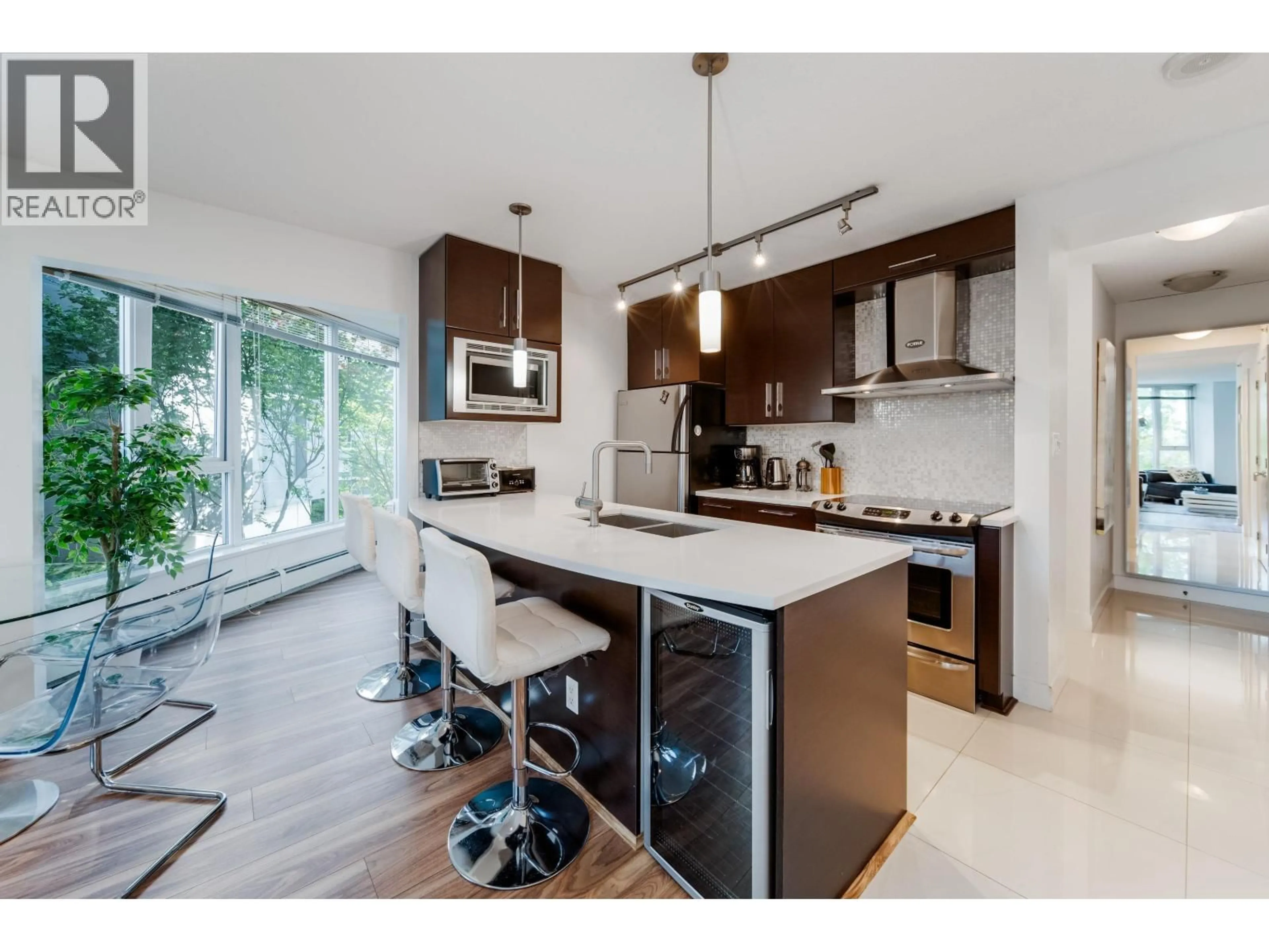 Open concept kitchen, wood/laminate floor for 301 - 689 ABBOTT STREET, Vancouver British Columbia V6B0J2