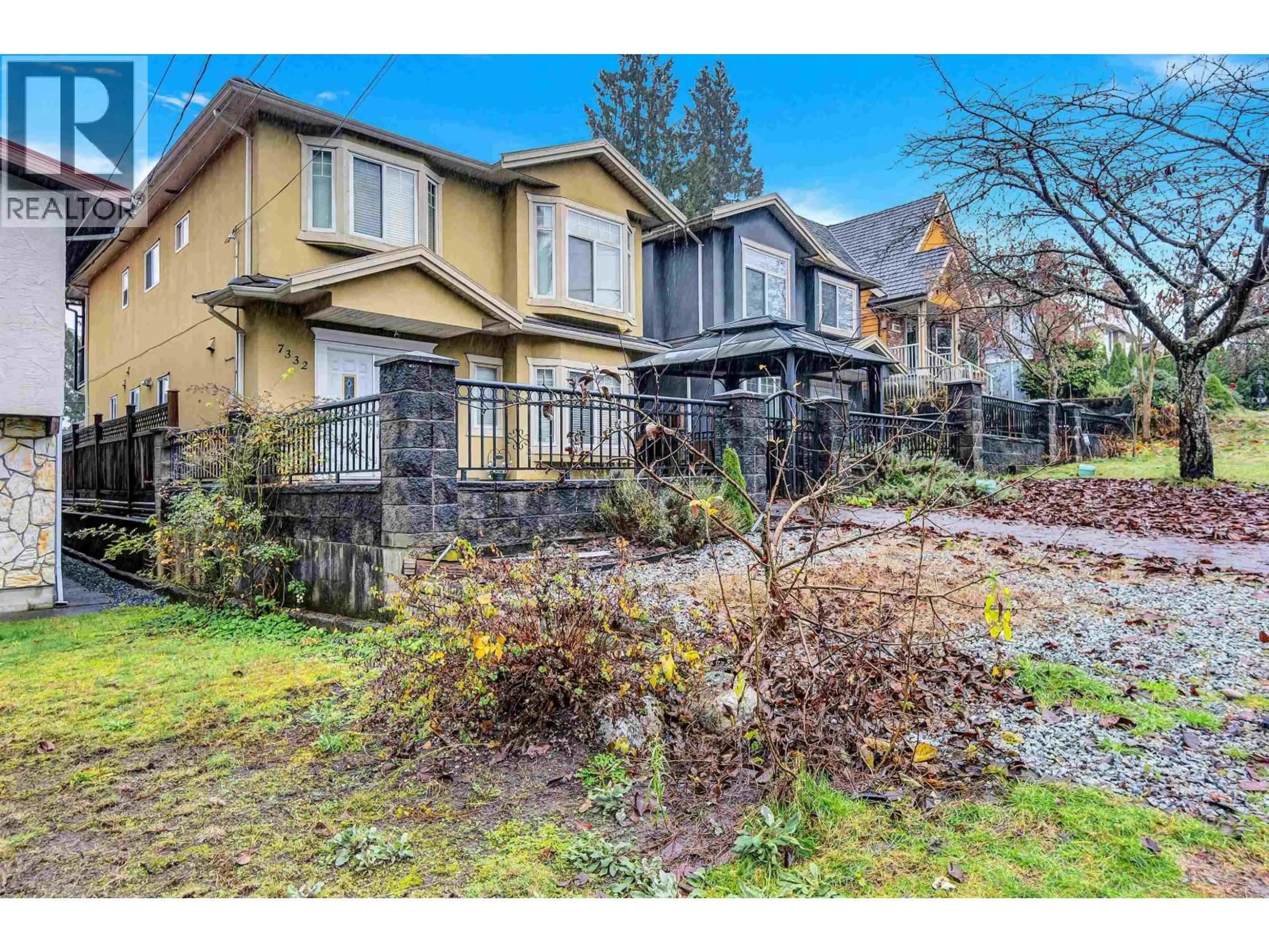 A pic from outside/outdoor area/front of a property/back of a property/a pic from drone, street for 7332 1ST STREET, Burnaby British Columbia V3N3S8