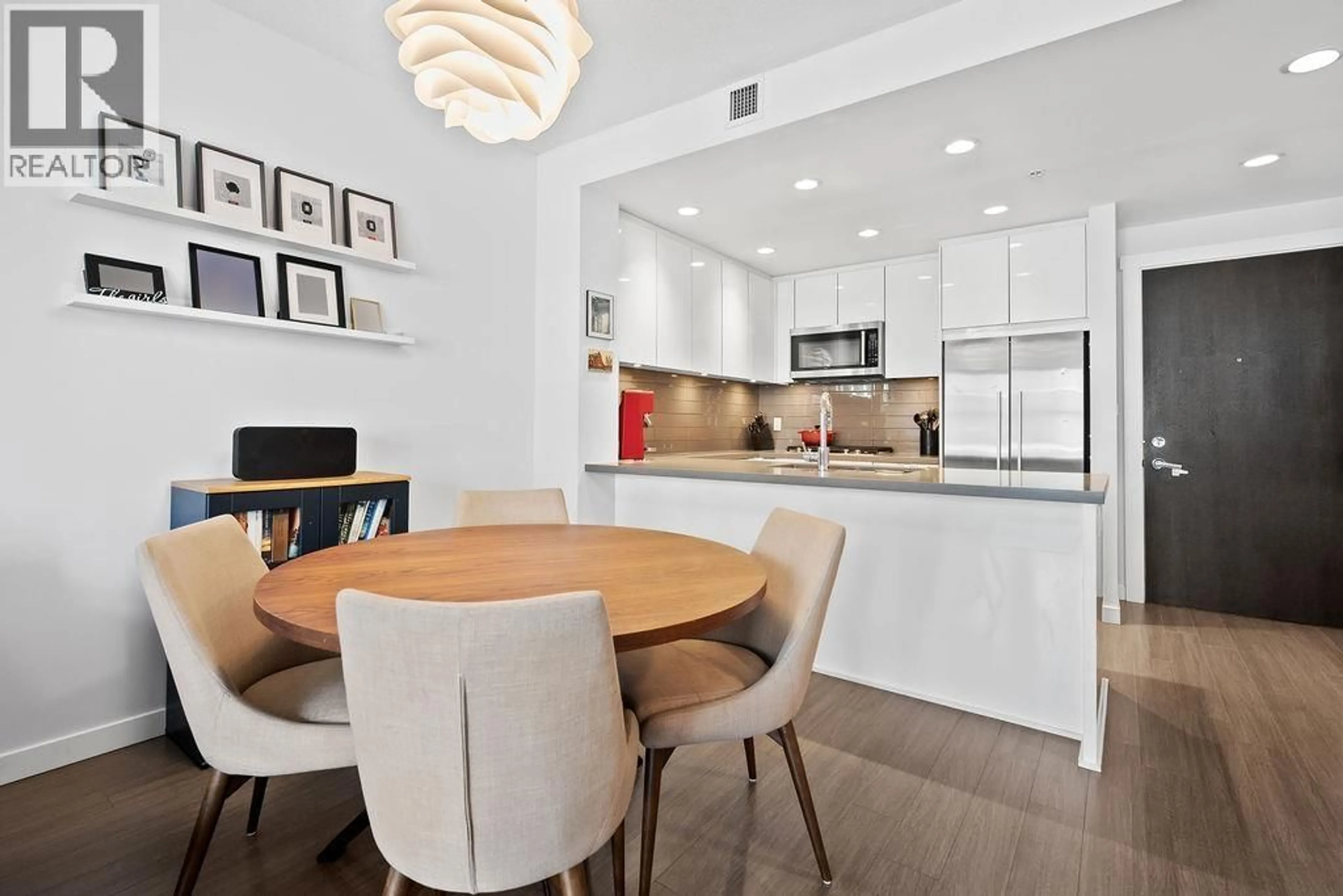 Open concept kitchen, unknown for 328 - 255 1ST STREET, North Vancouver British Columbia V7M3G8