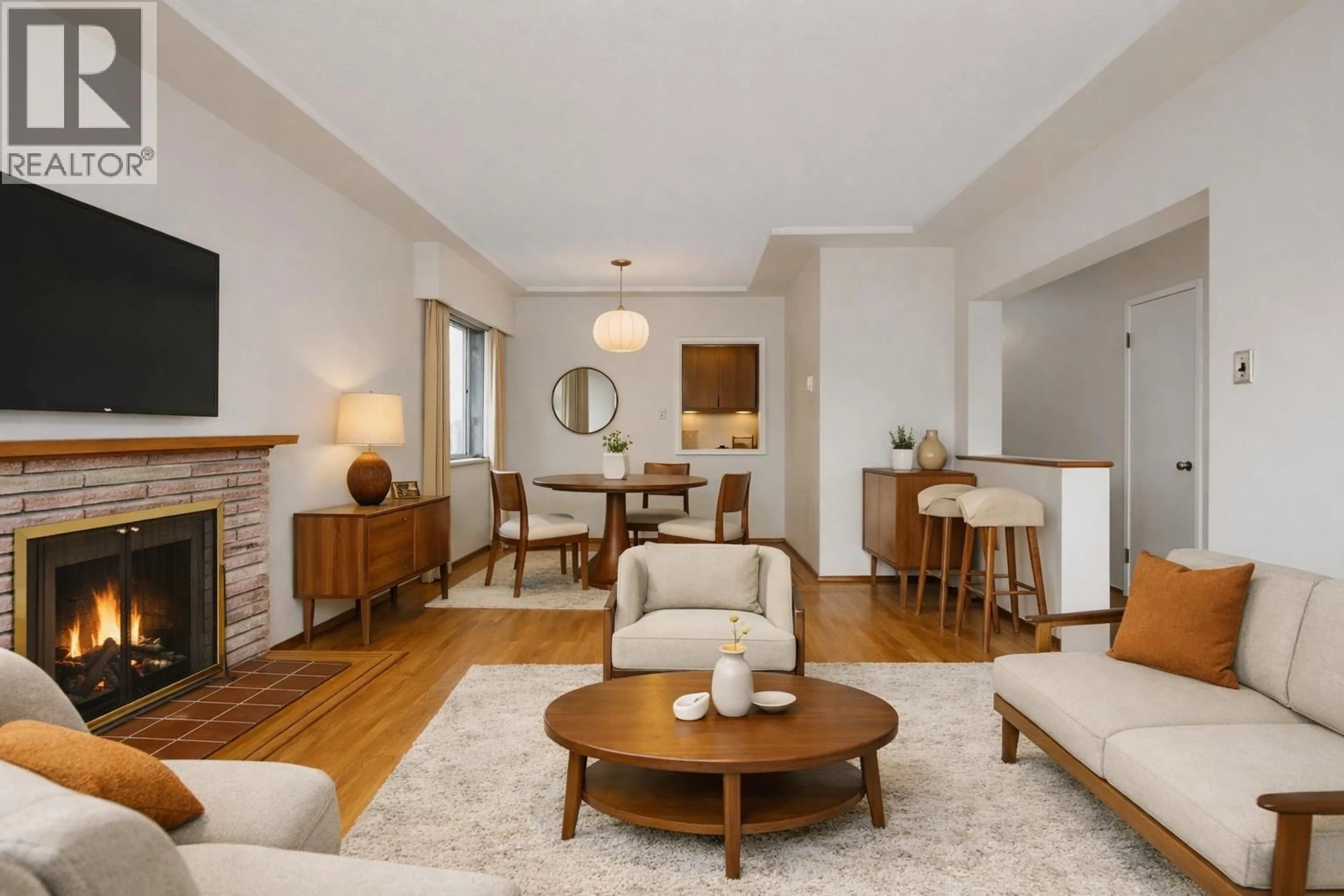 Living room with furniture, wood/laminate floor for 133 63RD AVENUE, Vancouver British Columbia V5X2H7