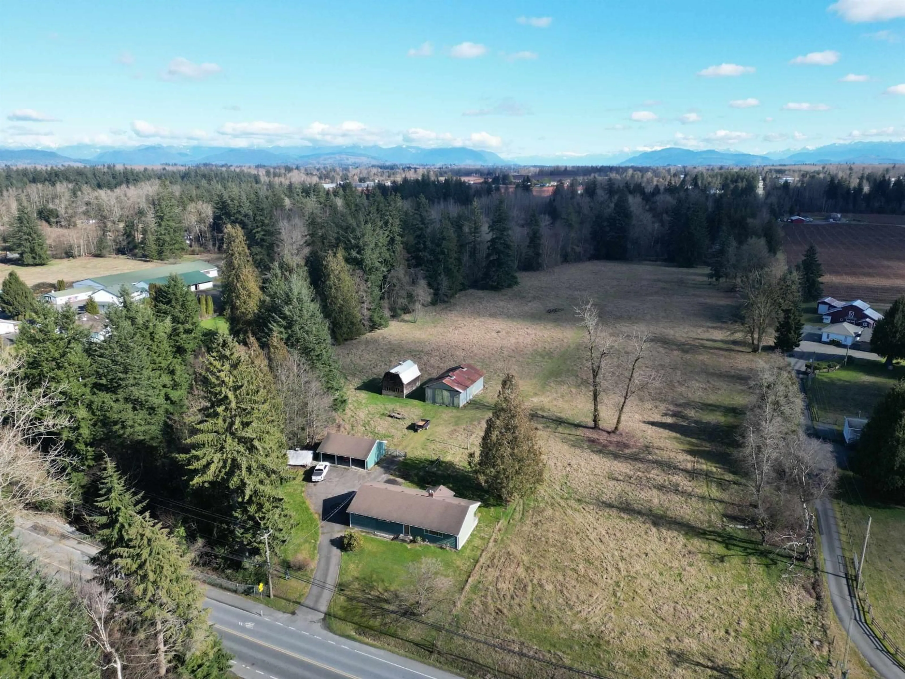 A pic from outside/outdoor area/front of a property/back of a property/a pic from drone, mountain view for 4824 248 STREET, Langley British Columbia V4W1A5