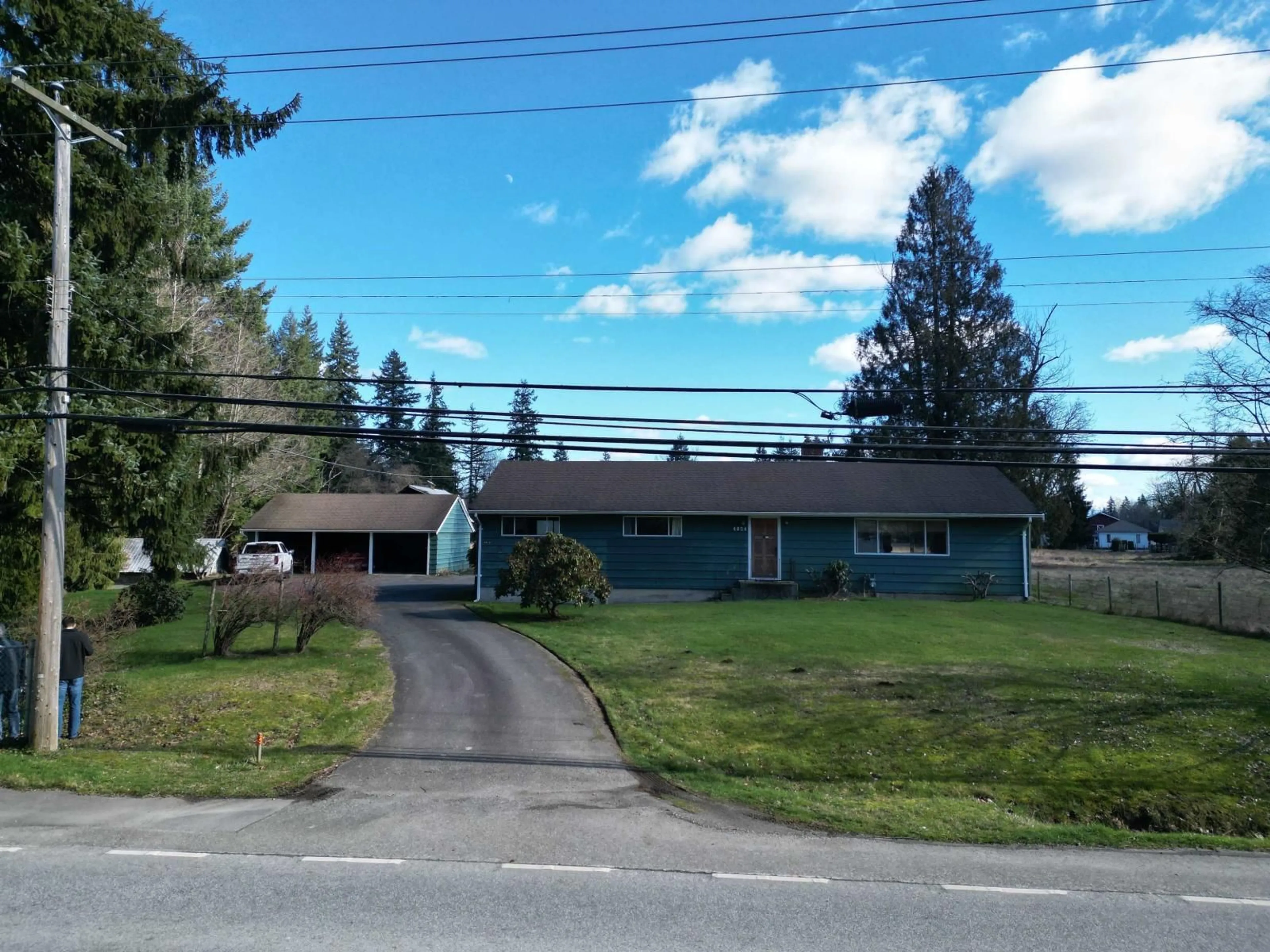 A pic from outside/outdoor area/front of a property/back of a property/a pic from drone, street for 4824 248 STREET, Langley British Columbia V4W1A5