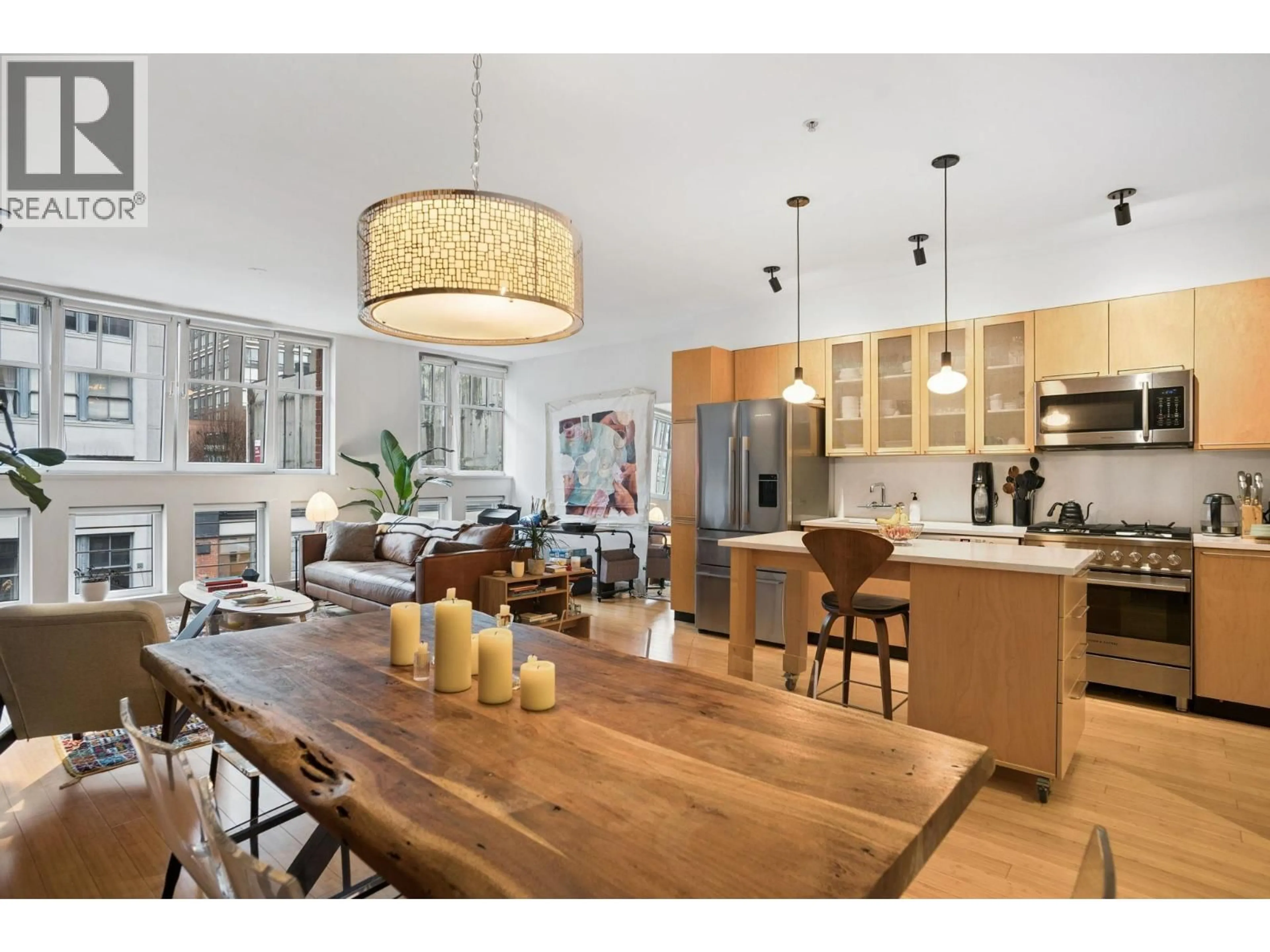 Open concept kitchen, wood/laminate floor for 401 - 1072 HAMILTON STREET, Vancouver British Columbia V6B2R9