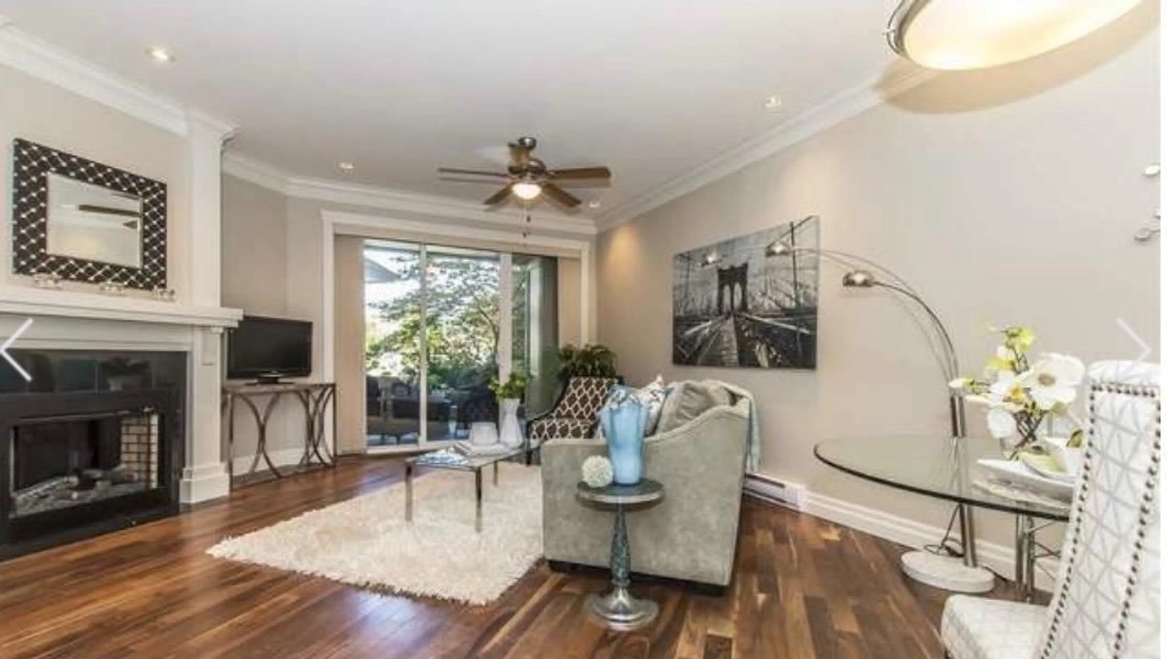 Living room with furniture, wood/laminate floor for 102B - 45595 TAMIHI WAY, Chilliwack British Columbia V2R0G3