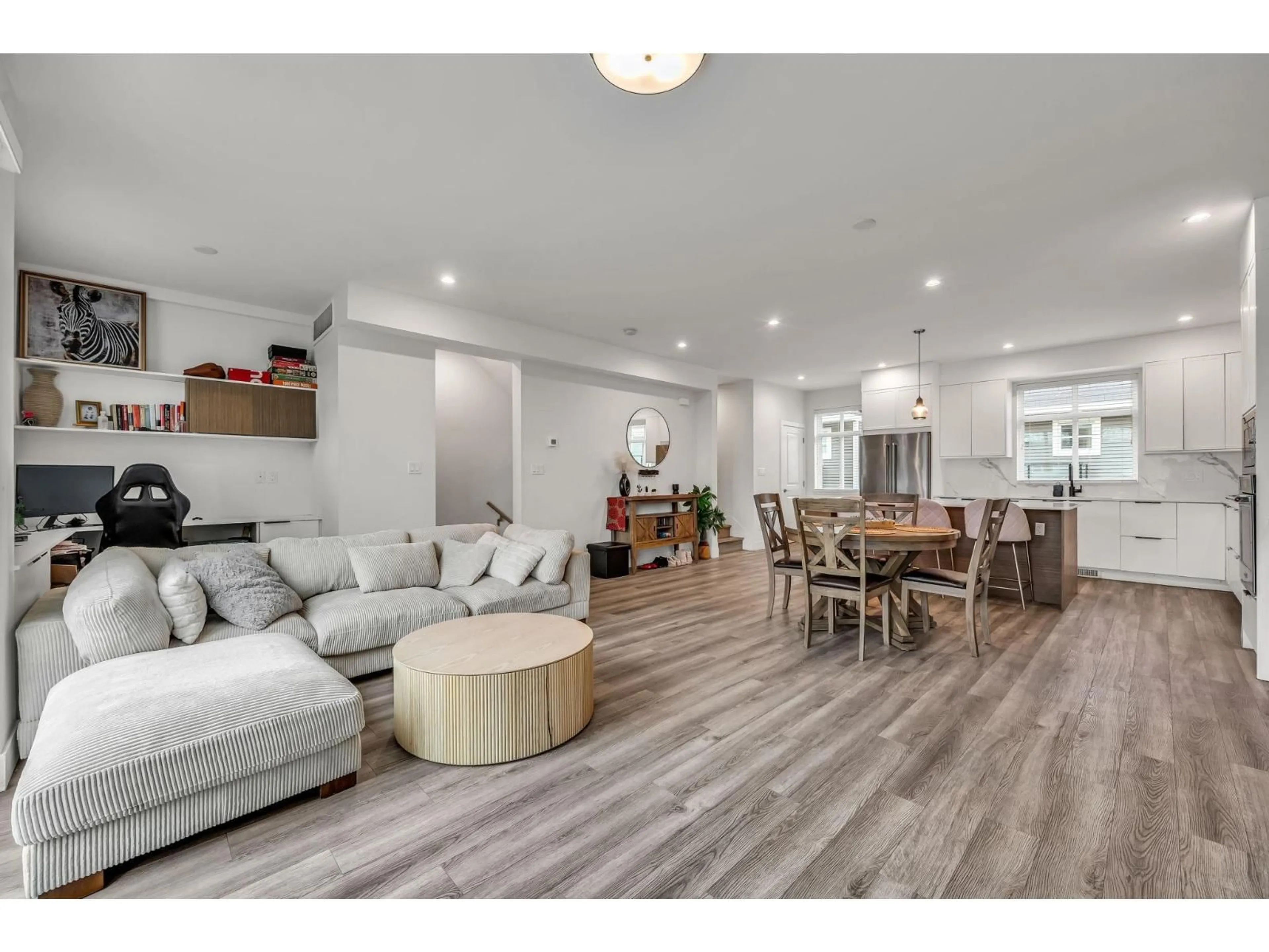 Living room with furniture, wood/laminate floor for 34 - 10488 124 STREET, Surrey British Columbia V3V0E9