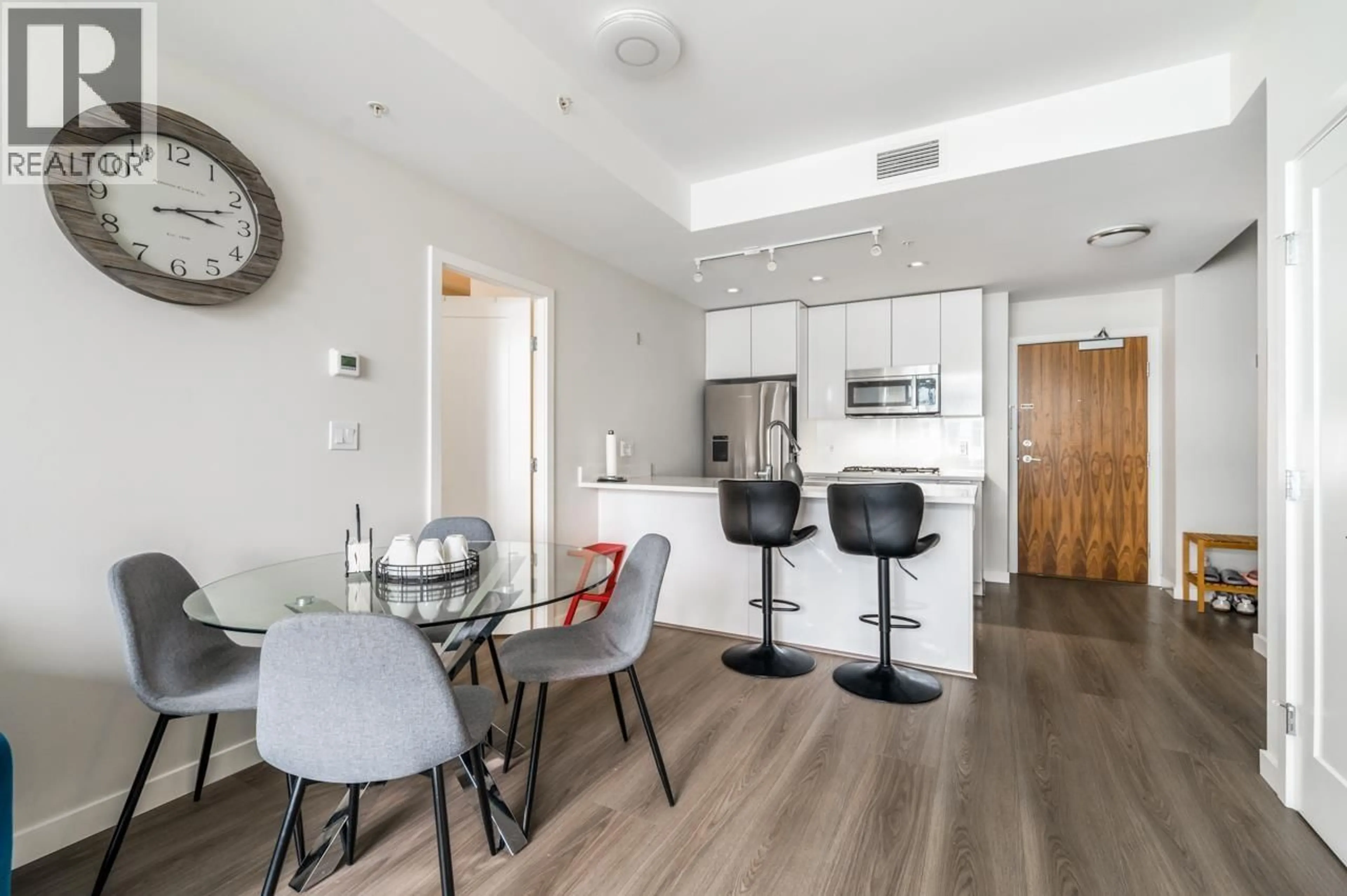 Open concept kitchen, wood/laminate floor for 919 - 8699 HAZELBRIDGE WAY, Richmond British Columbia V6X0T4