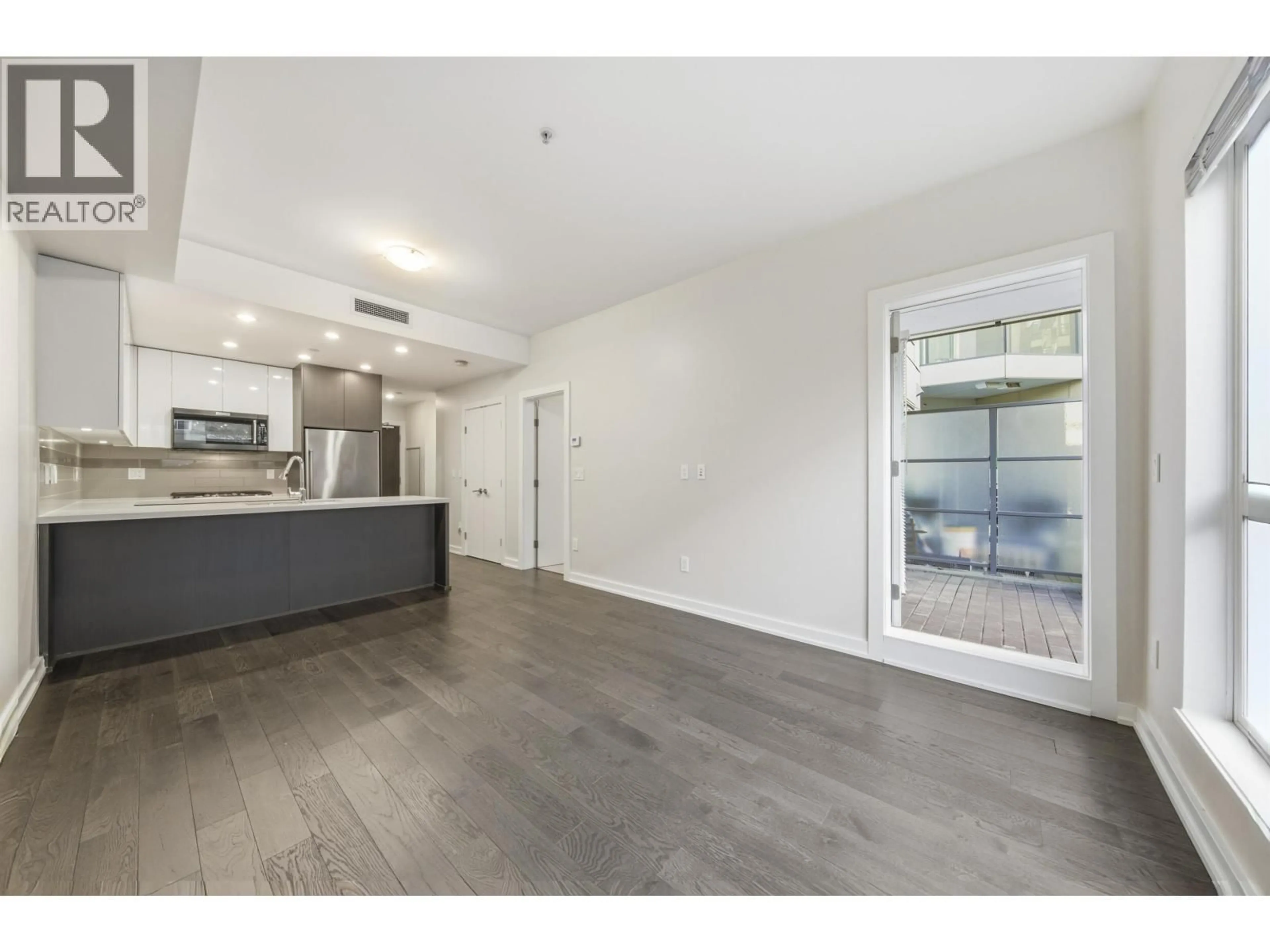 Open concept kitchen, unknown for 102 - 5311 CEDARBRIDGE WAY, Richmond British Columbia V6X0M3