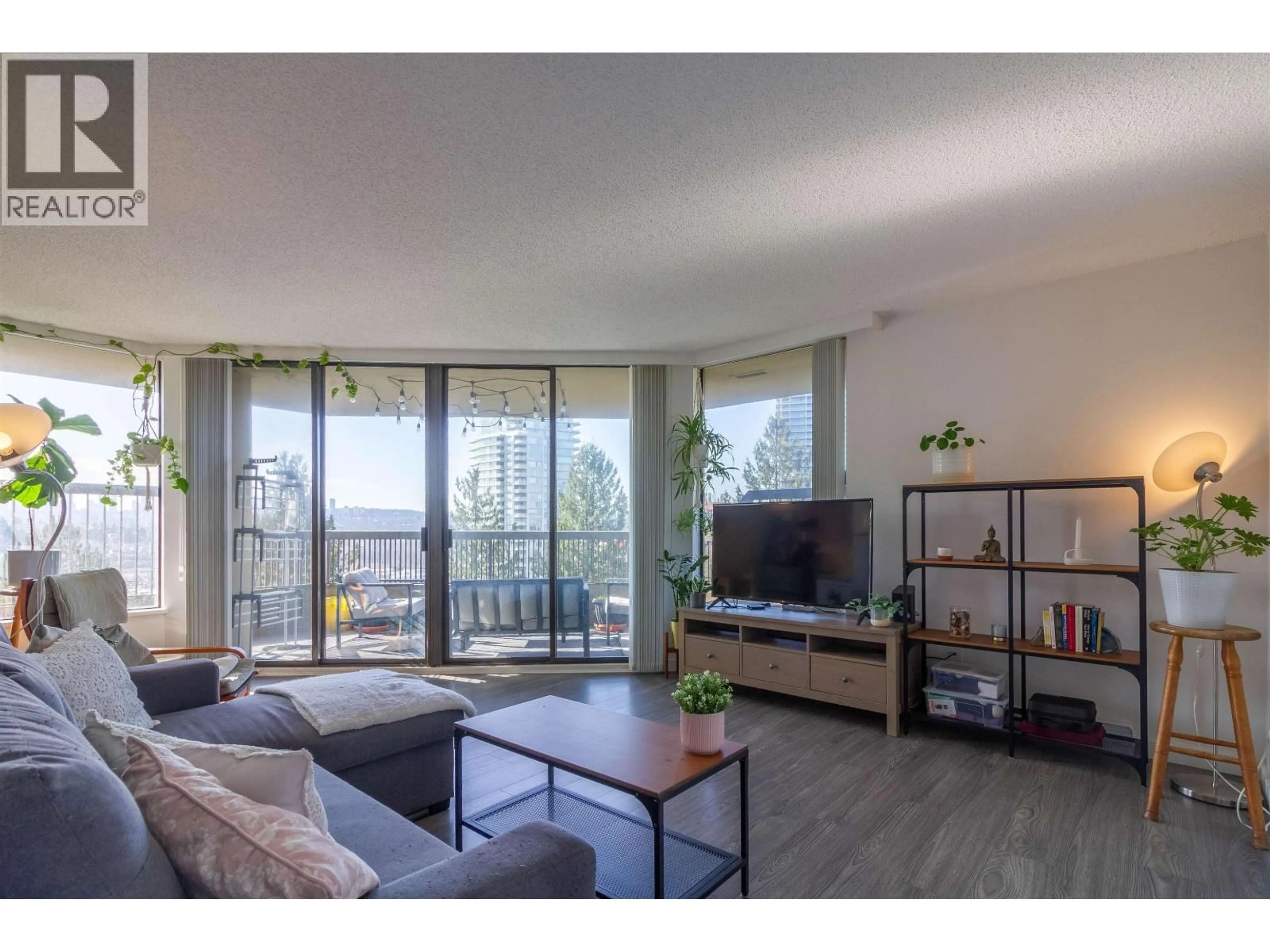 Living room with furniture, wood/laminate floor for 908 - 2041 BELLWOOD AVENUE, Burnaby British Columbia V5B4V5