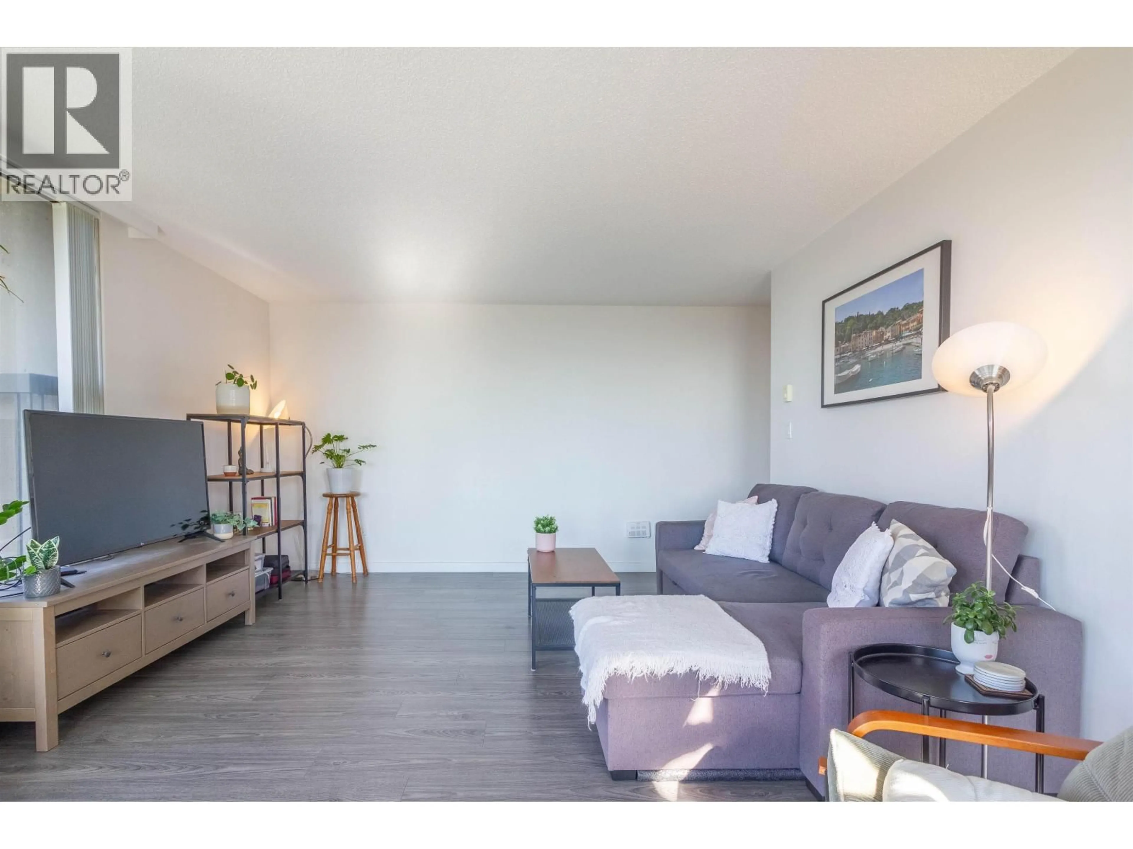 Living room with furniture, wood/laminate floor for 908 - 2041 BELLWOOD AVENUE, Burnaby British Columbia V5B4V5