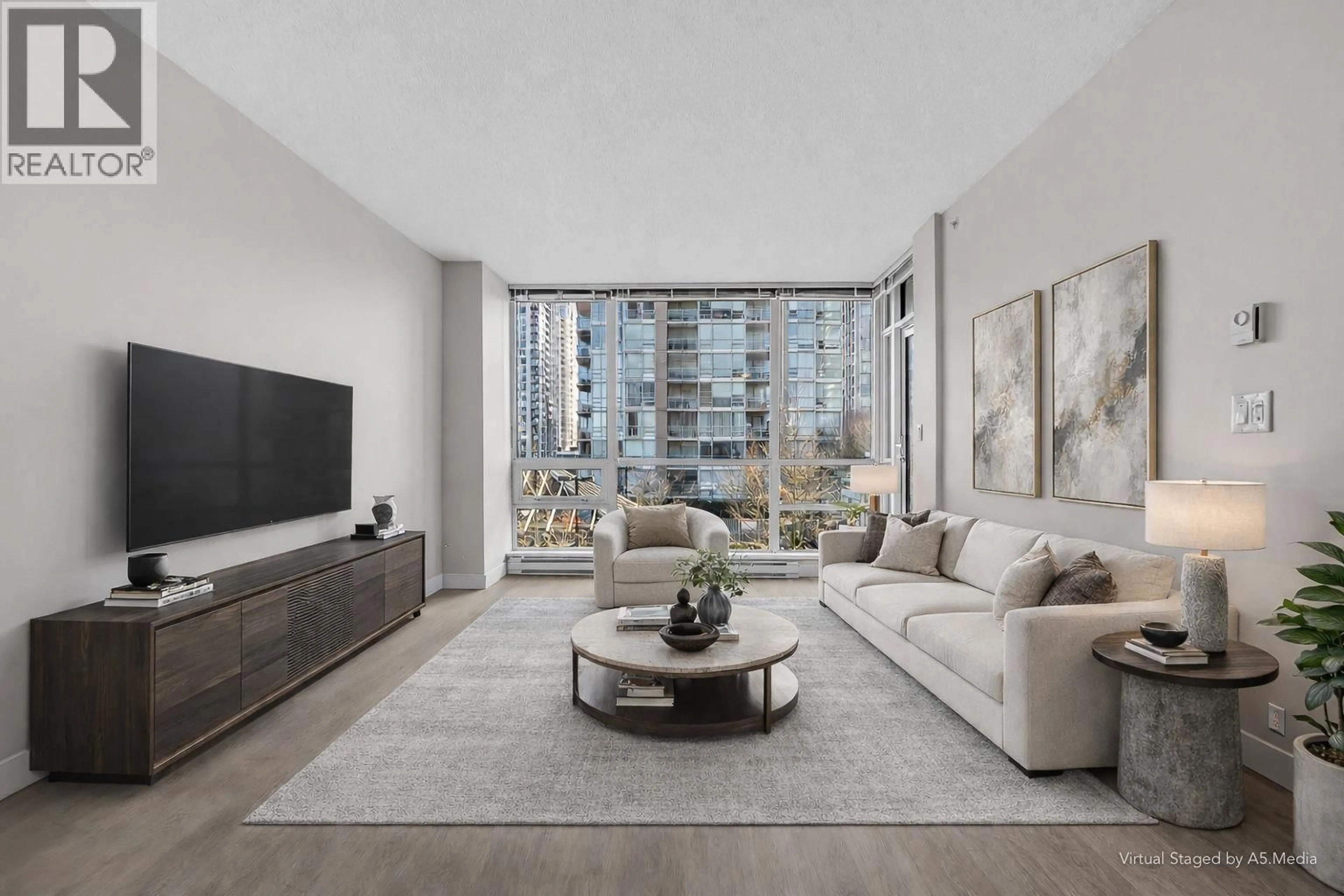 Living room with furniture, unknown for 706 - 2968 GLEN DRIVE, Coquitlam British Columbia V3B0C4