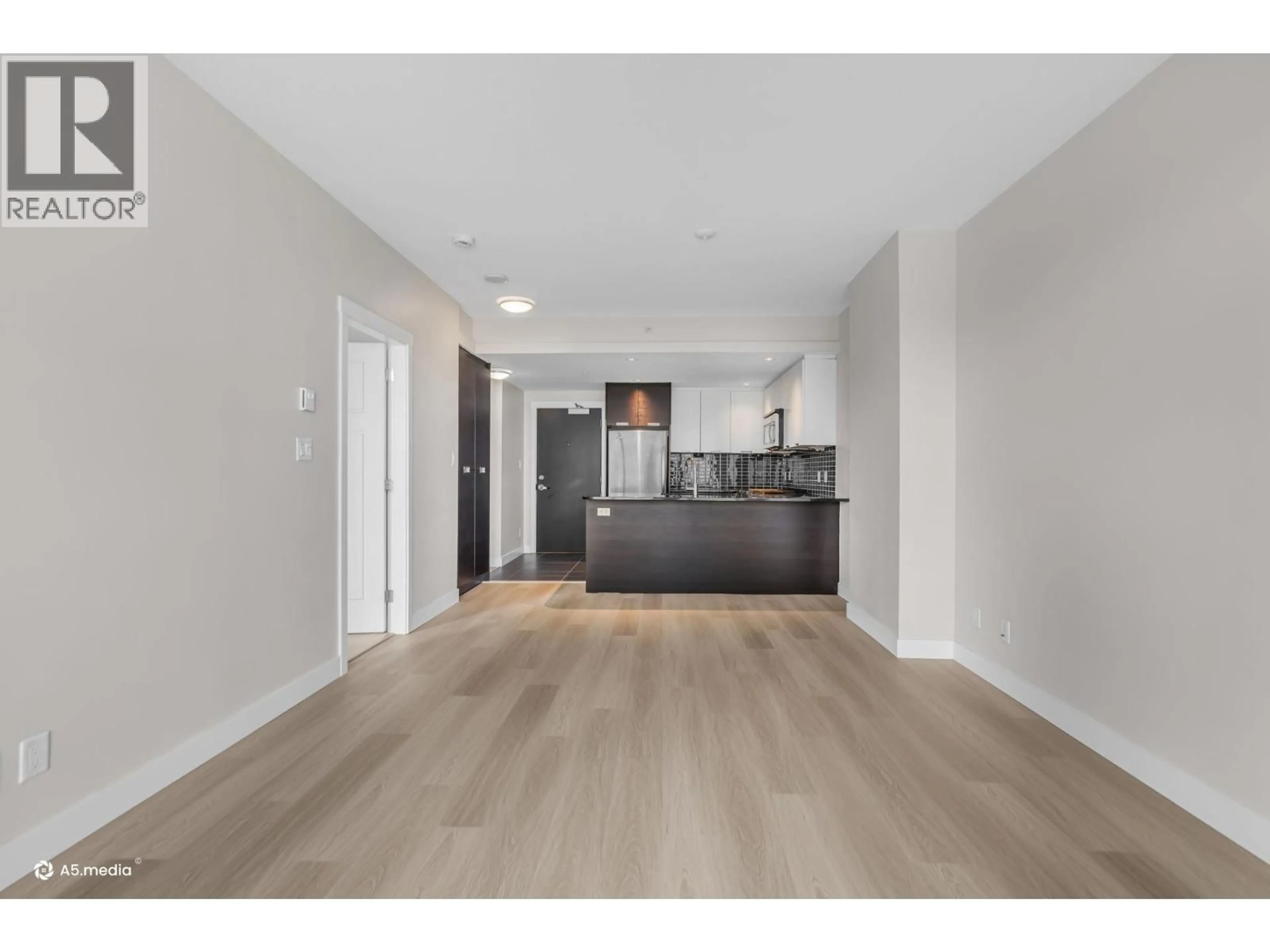 Open concept kitchen, unknown for 706 - 2968 GLEN DRIVE, Coquitlam British Columbia V3B0C4