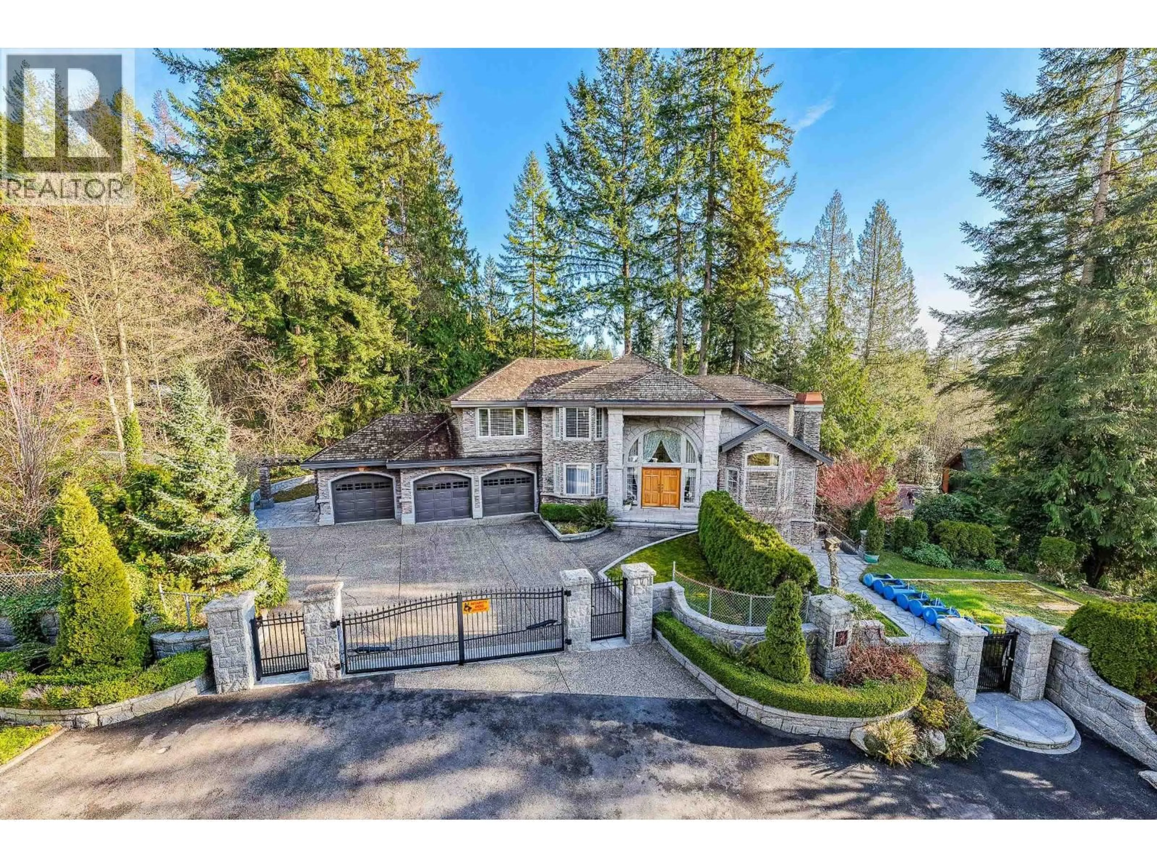 A pic from outside/outdoor area/front of a property/back of a property/a pic from drone, mountain view for 188 WYNDHAM CRESCENT, Anmore British Columbia V3H4X9